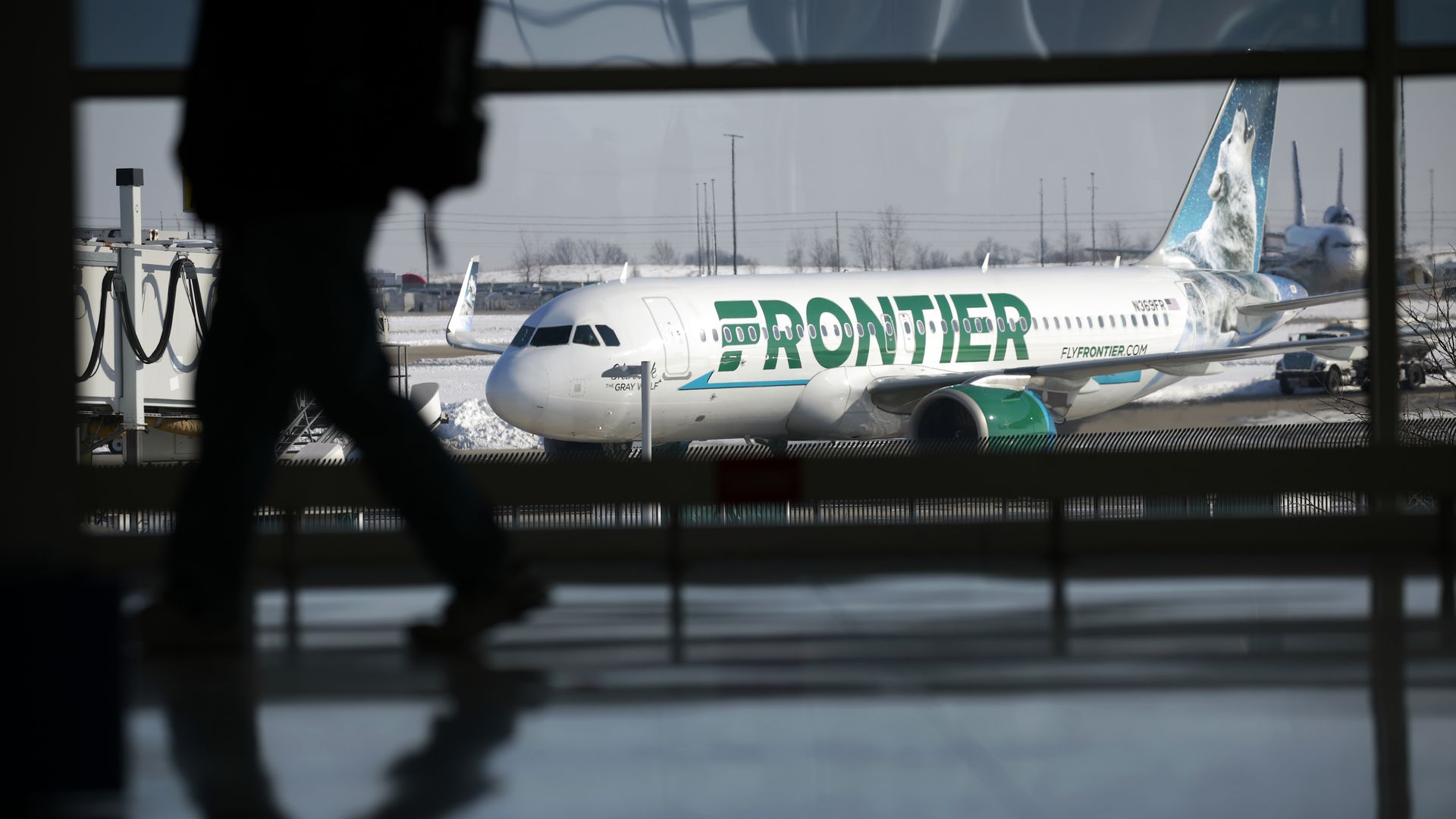 A Frontier Airlines airplane at Indianapolis International Airport in Indianapolis, Indiana, U.S., on Monday, Feb. 7, 2022. 