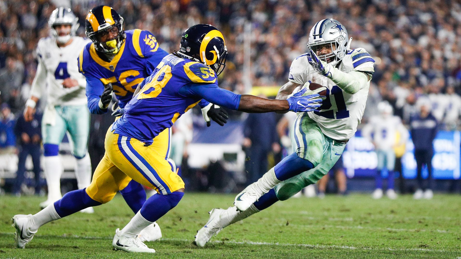 Ezekiel Elliott dodging a defender