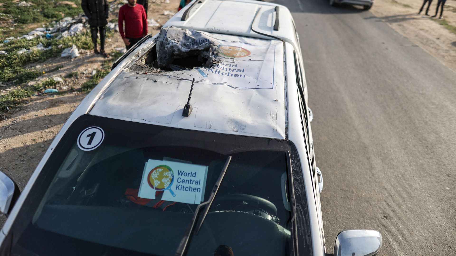 A view of damaged vehicle carrying Western employees 