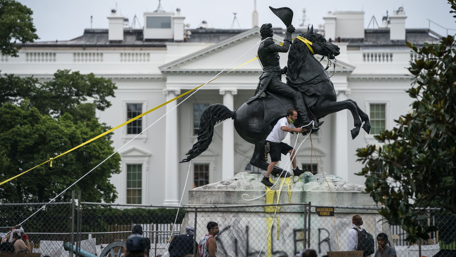  Protesters attempt to pull down the statue of Andrew Jackson in Lafayette Square near the White House on June 22, 2020 in Washington, DC. 