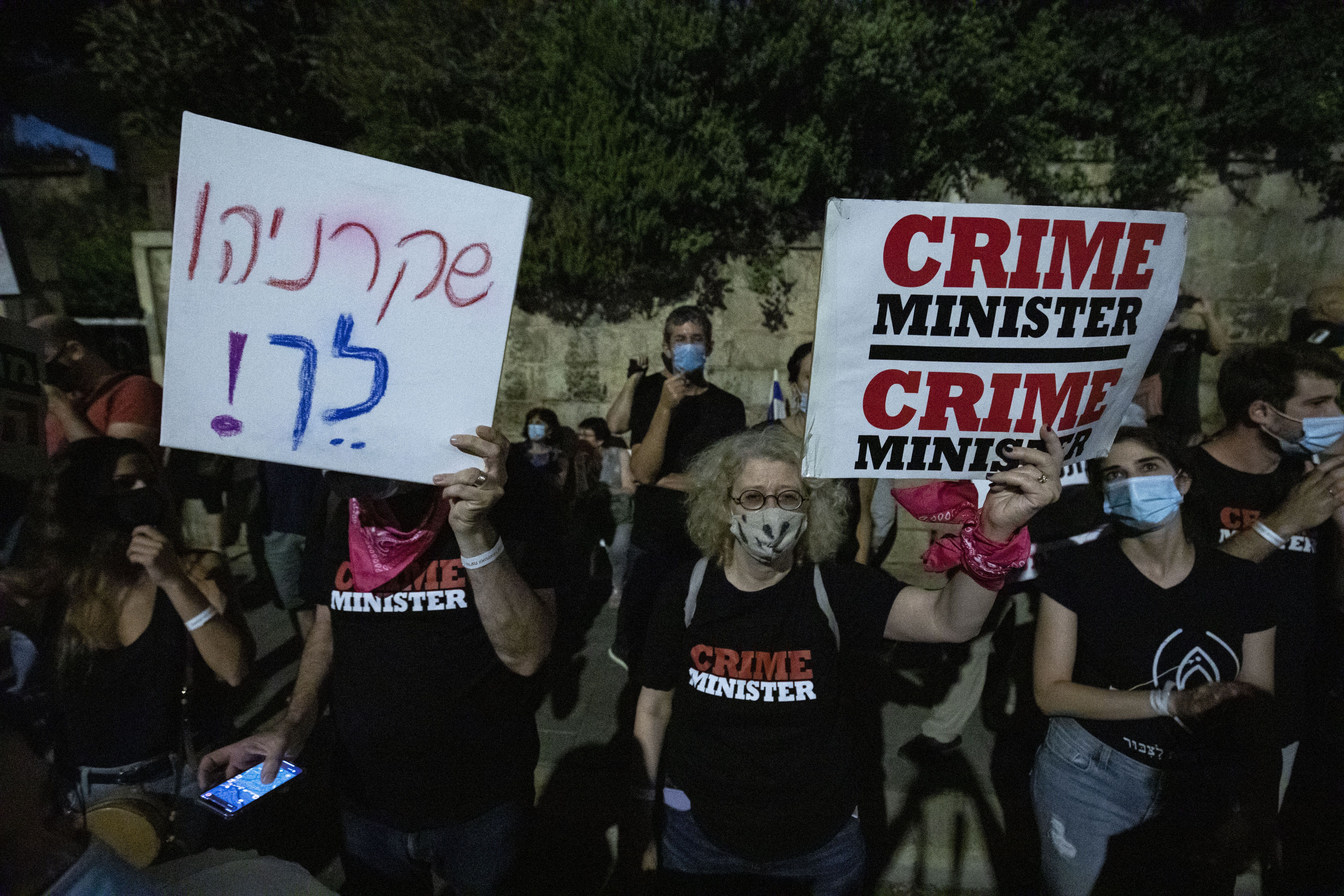 Israelis demonstrate against Israeli Prime Minister Benjamin Netanyahu's handling of the coronavirus.
