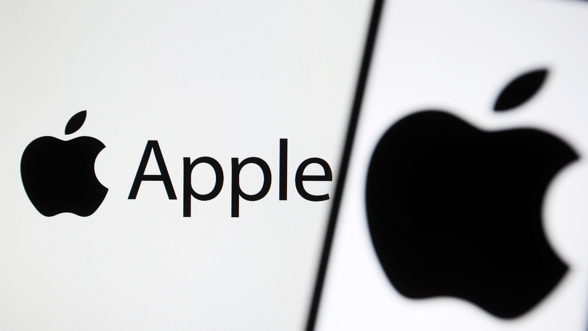 A black and white photo illustration with multiple Apple logos