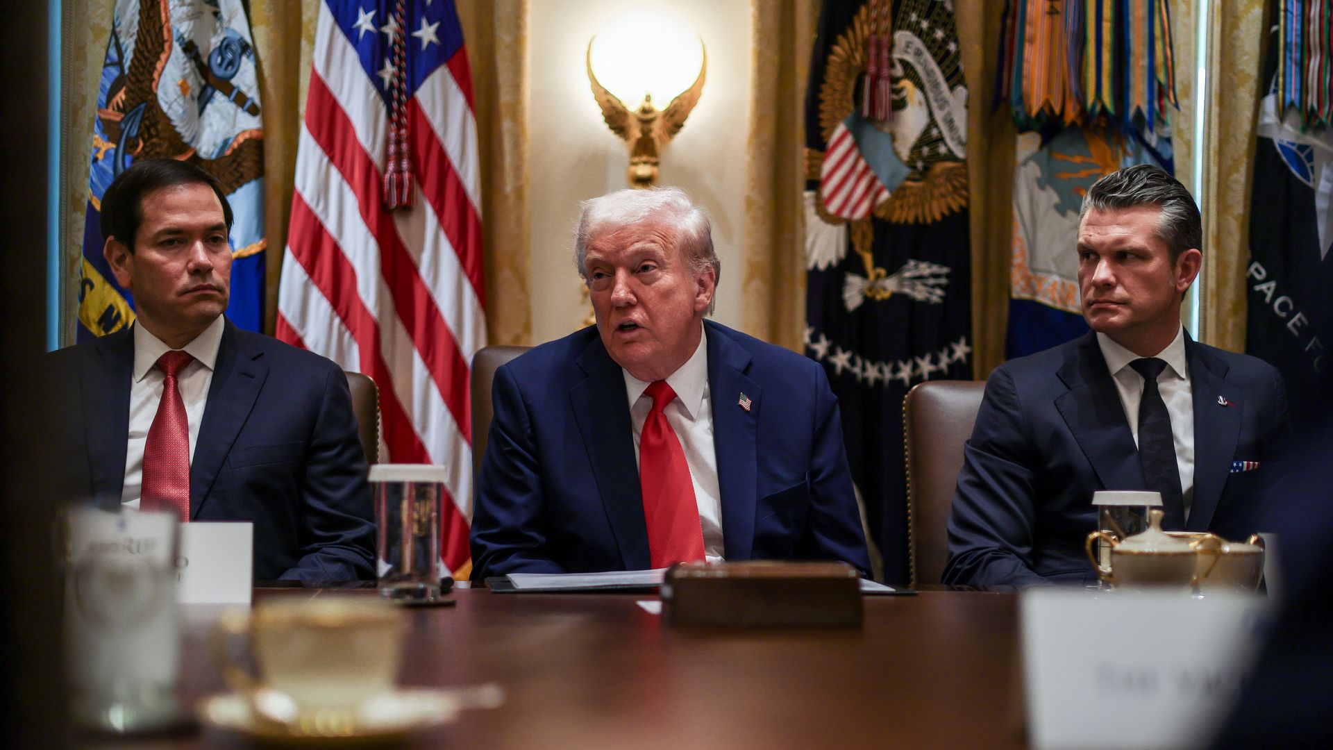 Marco Rubio, US secretary of state, from left, US President Donald Trump, and Pete Hegseth, US secretary of defense, during a cabinet meeting at the White House in Washington, DC, US, on Thursday, Oct. 9, 2025. 