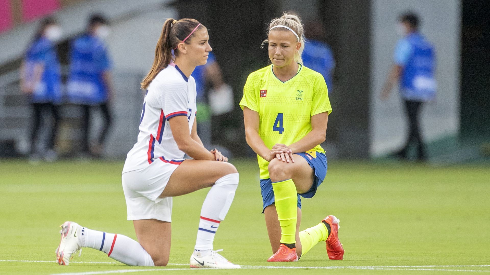 The U.S. and Swedish women's soccer teams took a knee ahead of their match Wednesday to protest racism and discrimination.