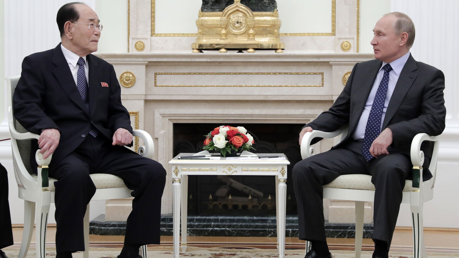 Putin and a North Korean official