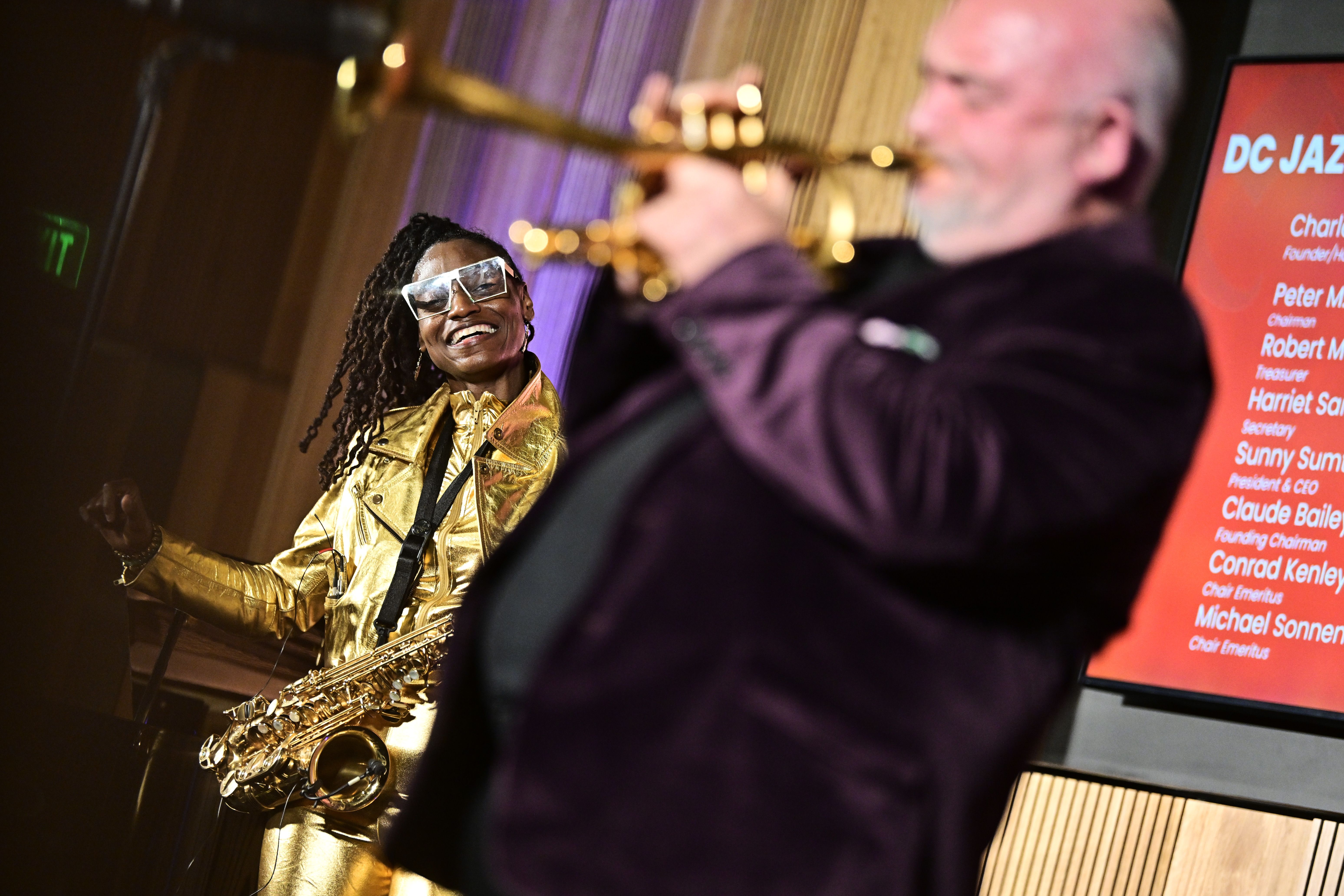 Jazz trumpeter James Morrison performs as saxophonist Lakecia Benjamin looks on at the DC JazzFest 20th Anniversary Opening Night Celebration at the Embassy Of Australia on August 28, 2024 in Washington, DC. (Photo by Shannon Finney/Getty Images)