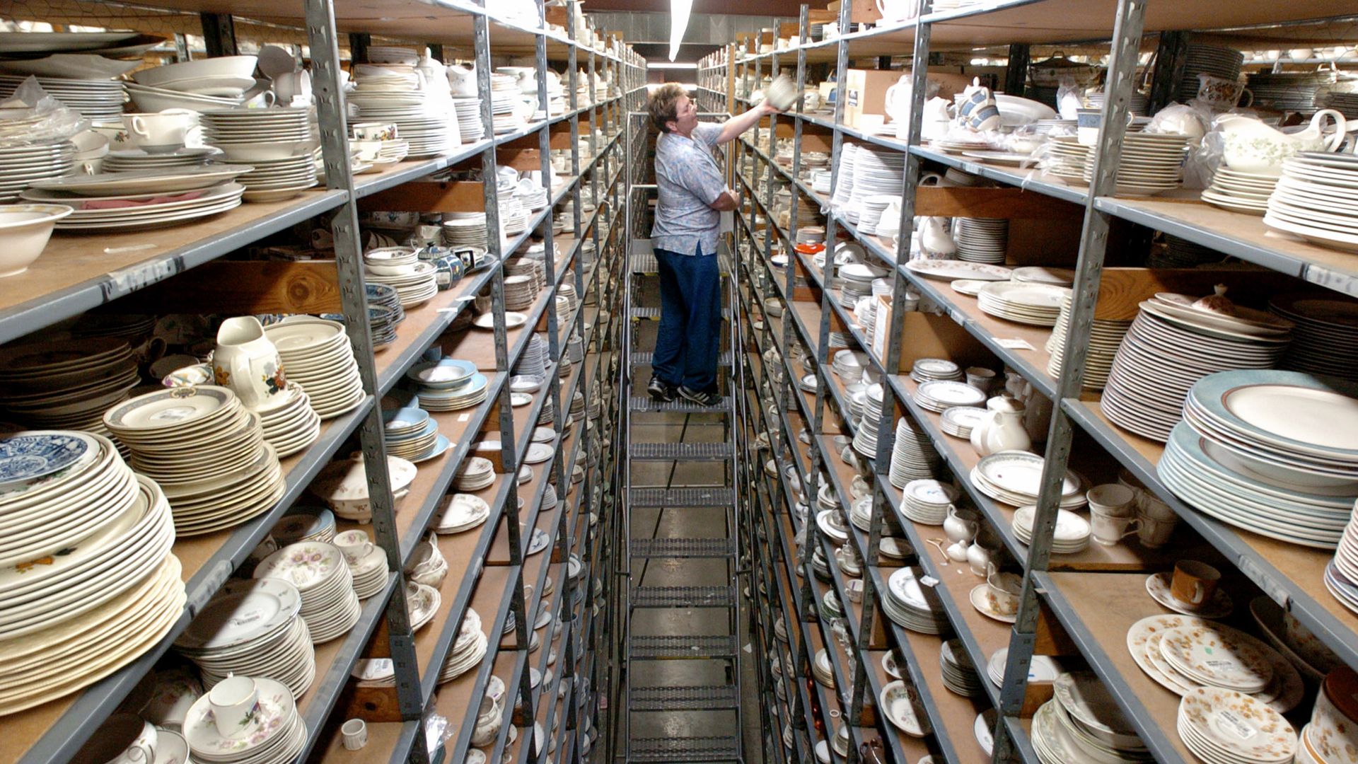 a warehouse full of dishes  - mostly plates - at Replacements Ltd.