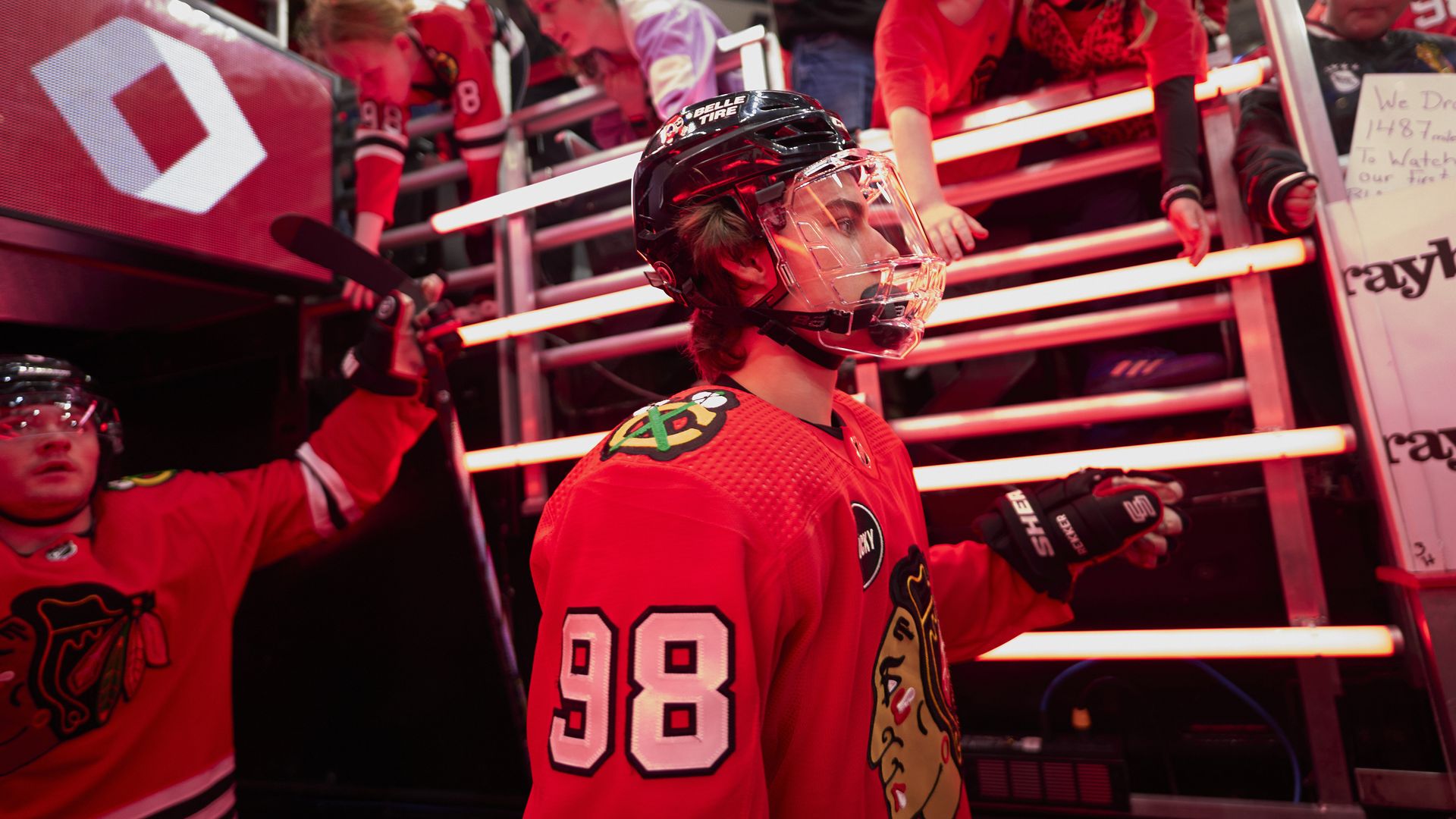 Photo of a hockey player coming onto the ice from the locker room 
