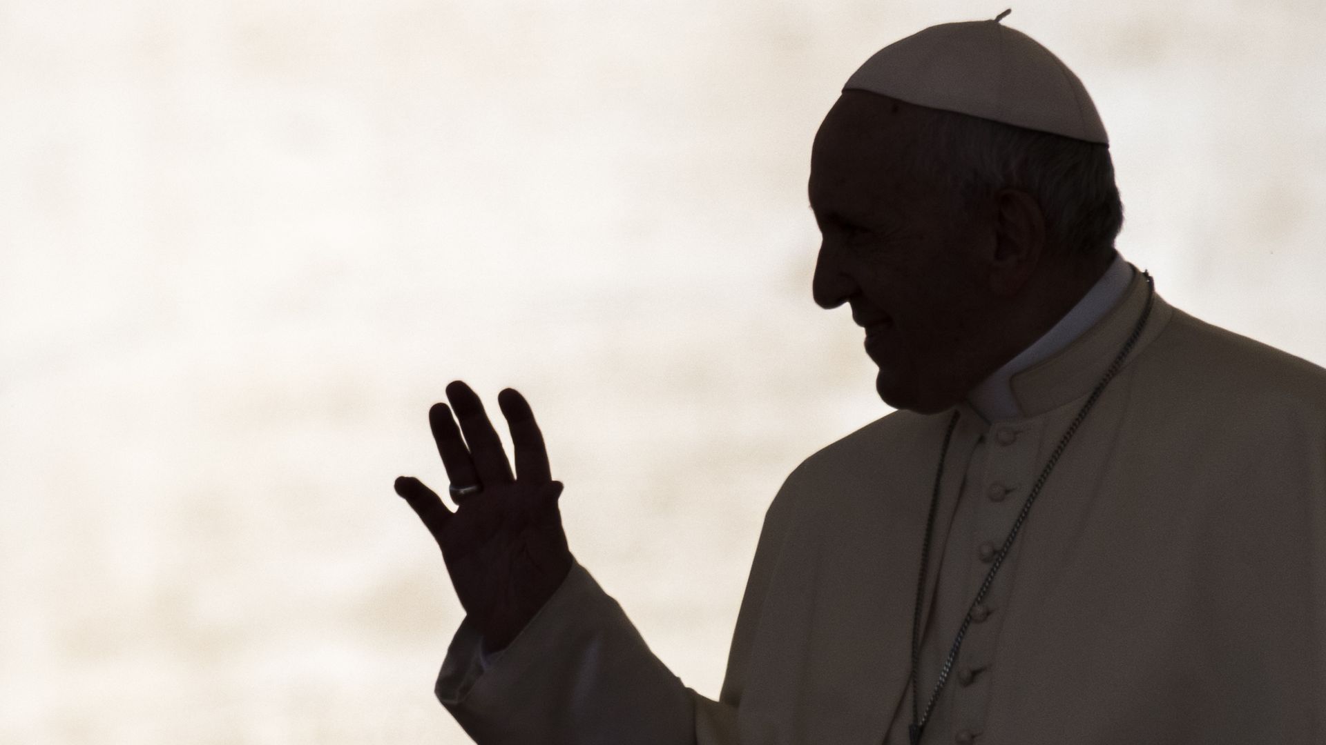 Pope Francis waving.
