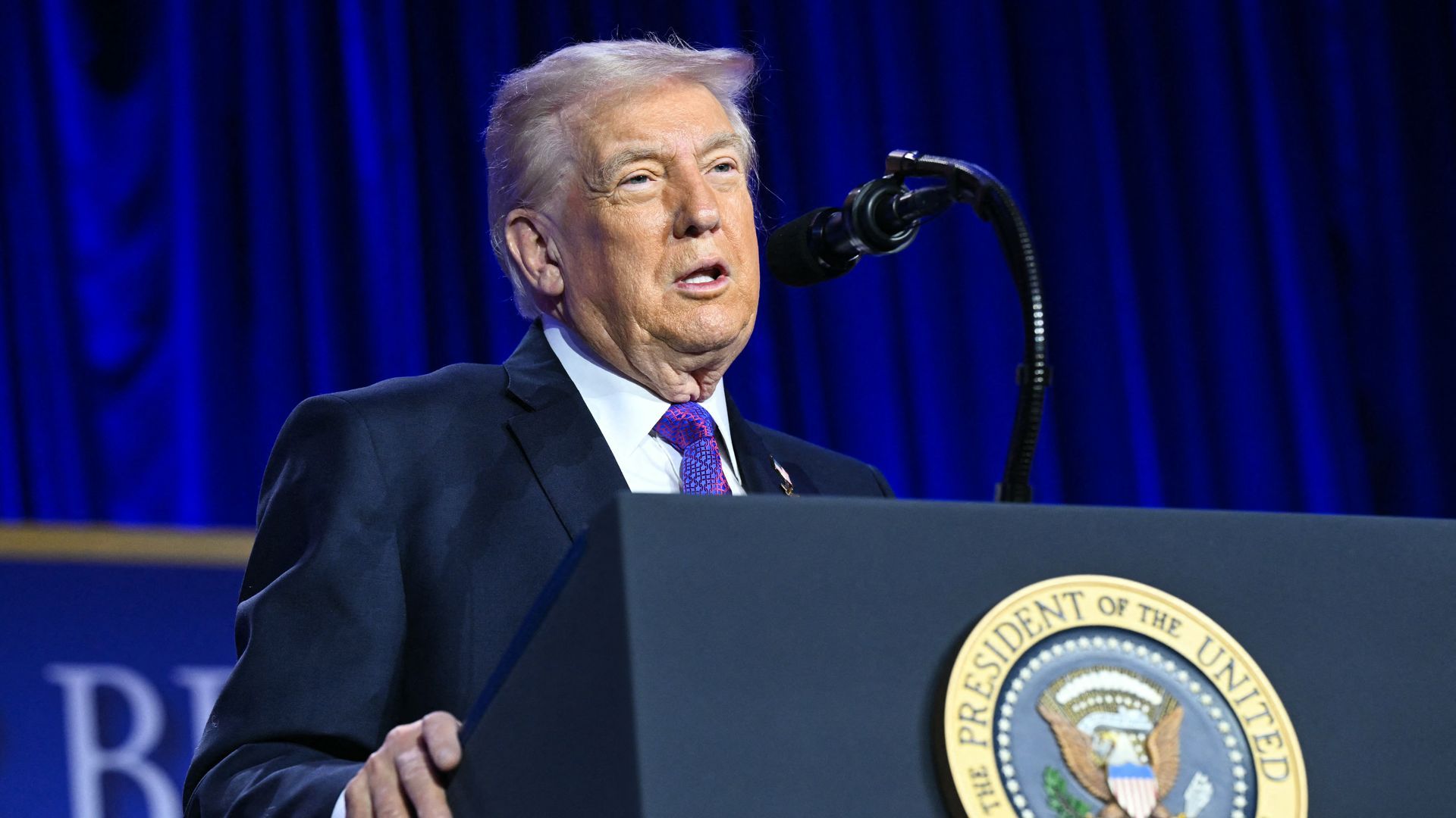 Trump speaking at a breakfast