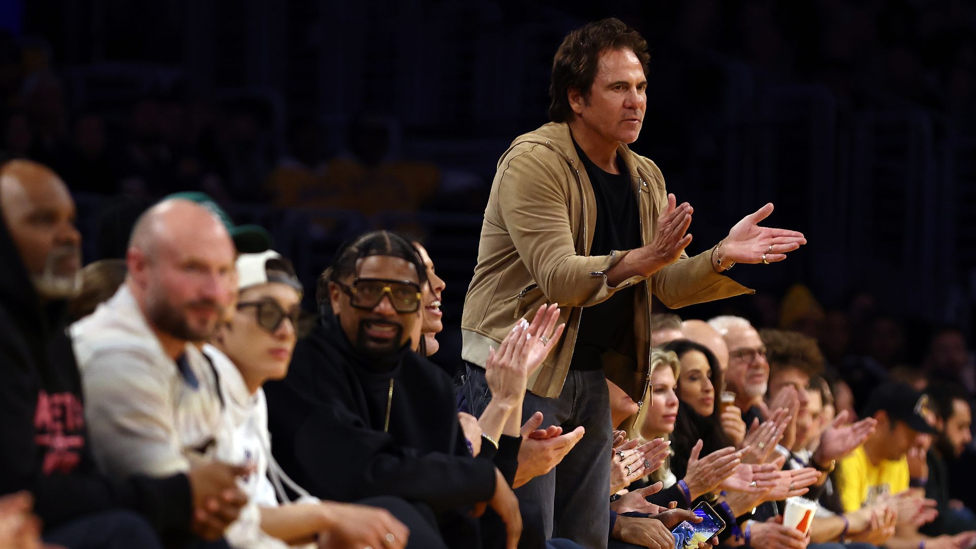 Pistons owner Tom Gores reacts to a play during Tuesday's game against the Los Angeles Lakers at Crypto.com Arena. 