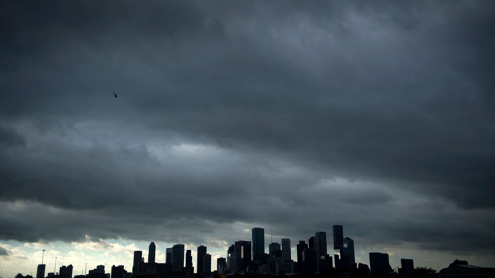 Rain clouds form over the Houston skyline