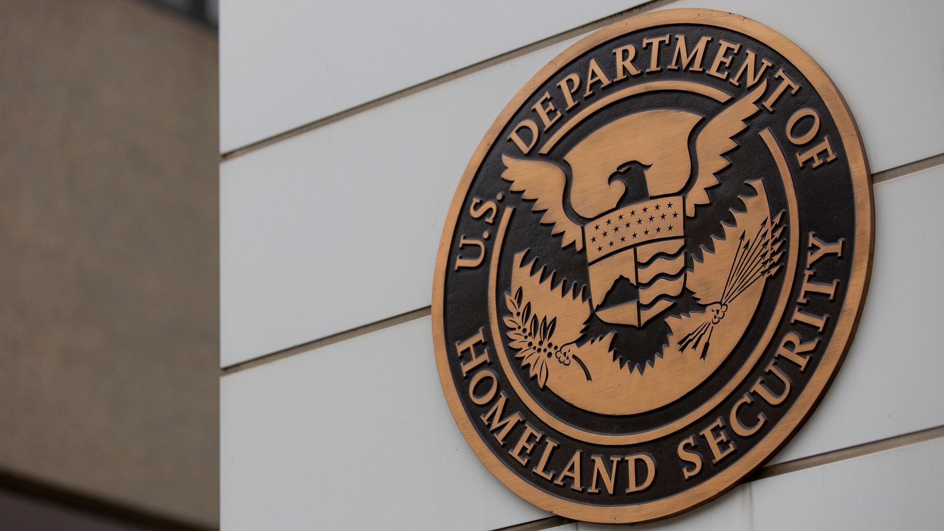 The seal of the Department of Homeland Security on a building. 