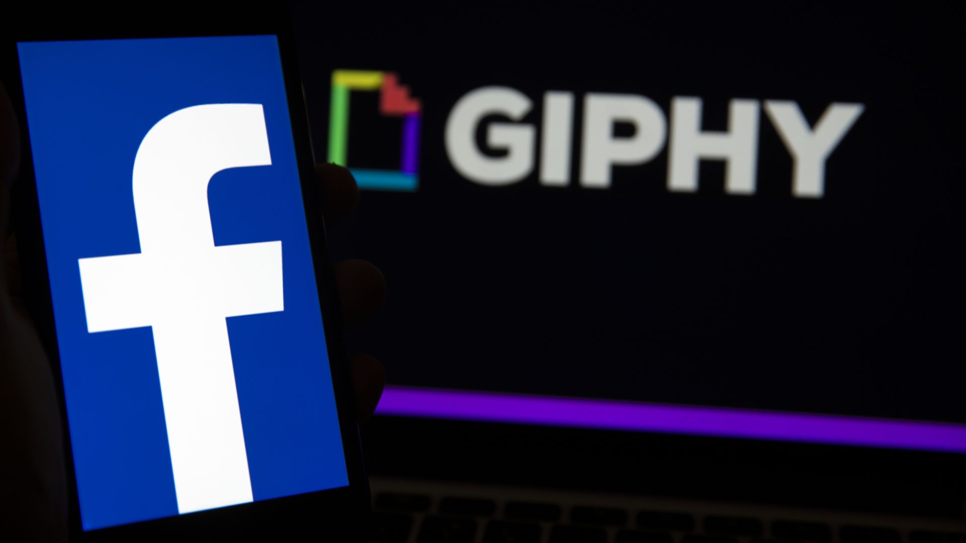 A photo illustration of the Facebook and Giphy logos on a laptop and mobile screen