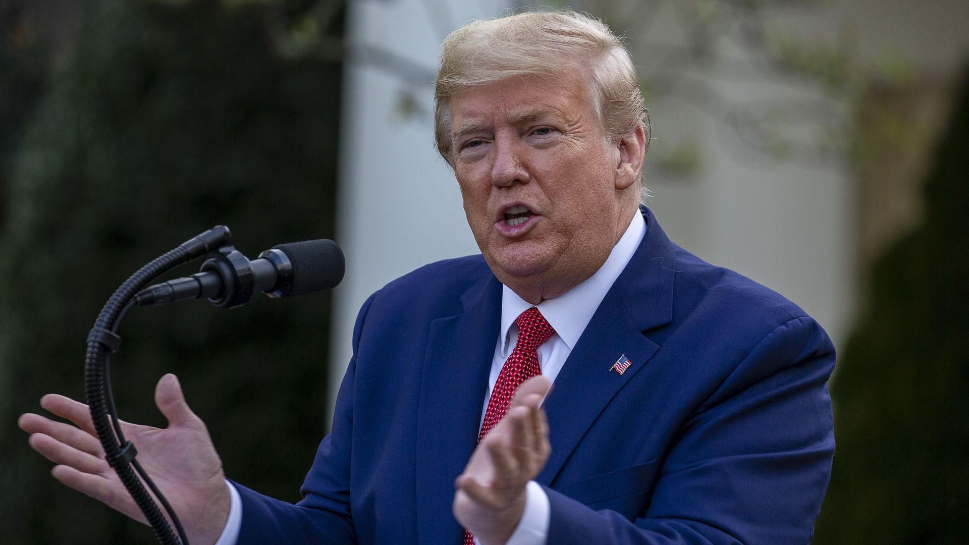 President Donald Trump takes questions from reporters in the Rose Garden for the daily coronavirus briefing at the White House on March 29
