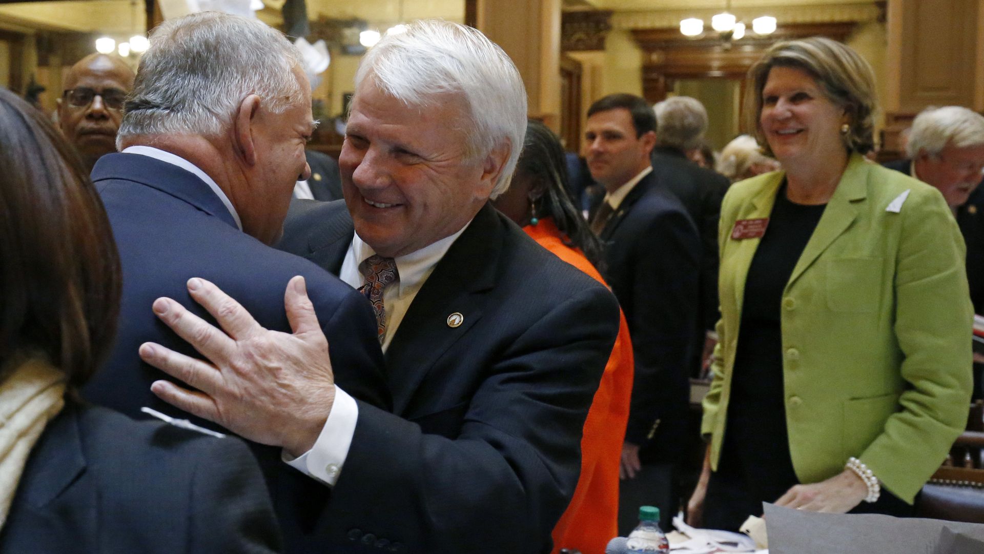 Jon Burns hugs David Ralston