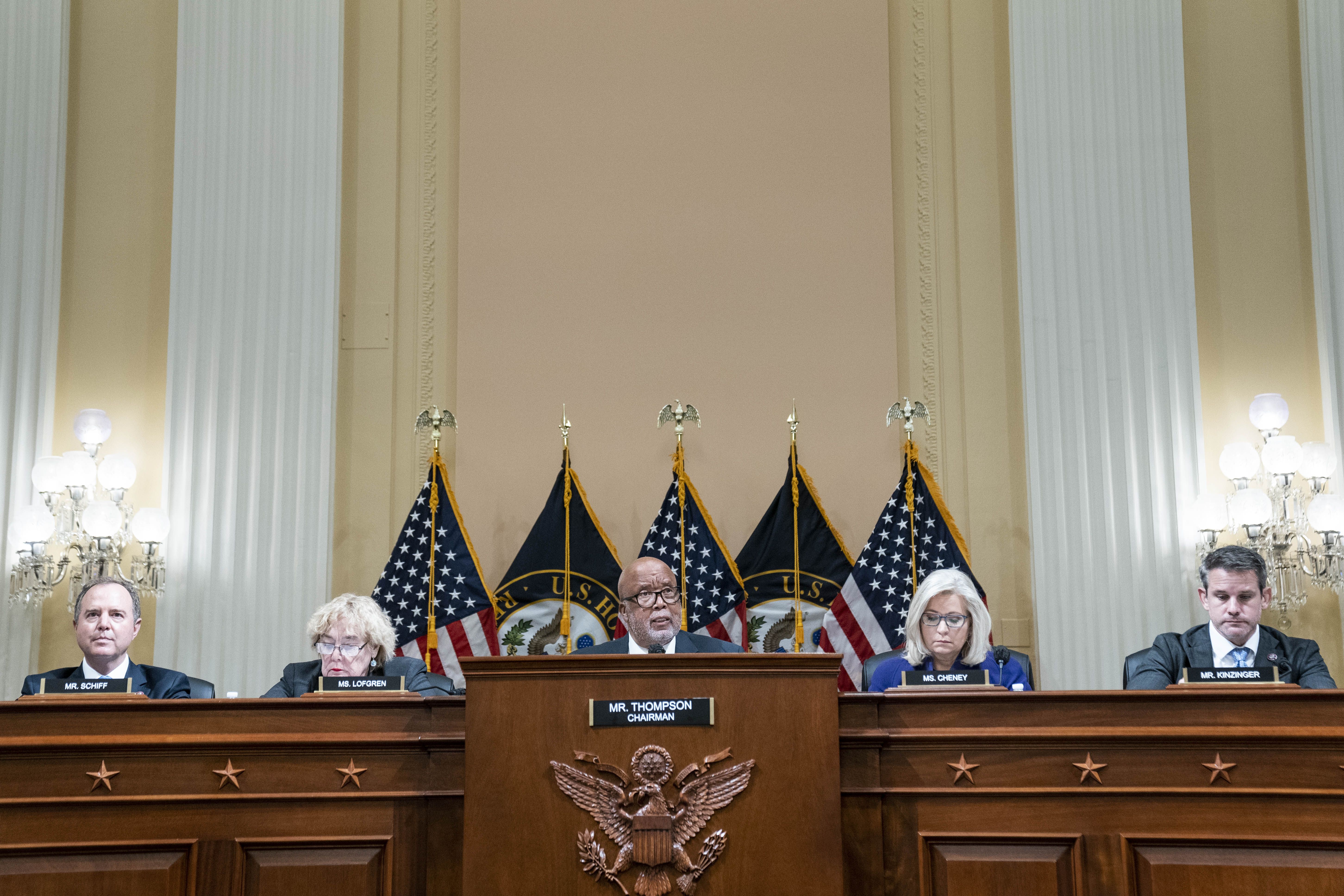 Photo of Bennie Thompson, Liz Cheney and other members of the Jan. 6 select committee sitting in a Capitol Hill chamber