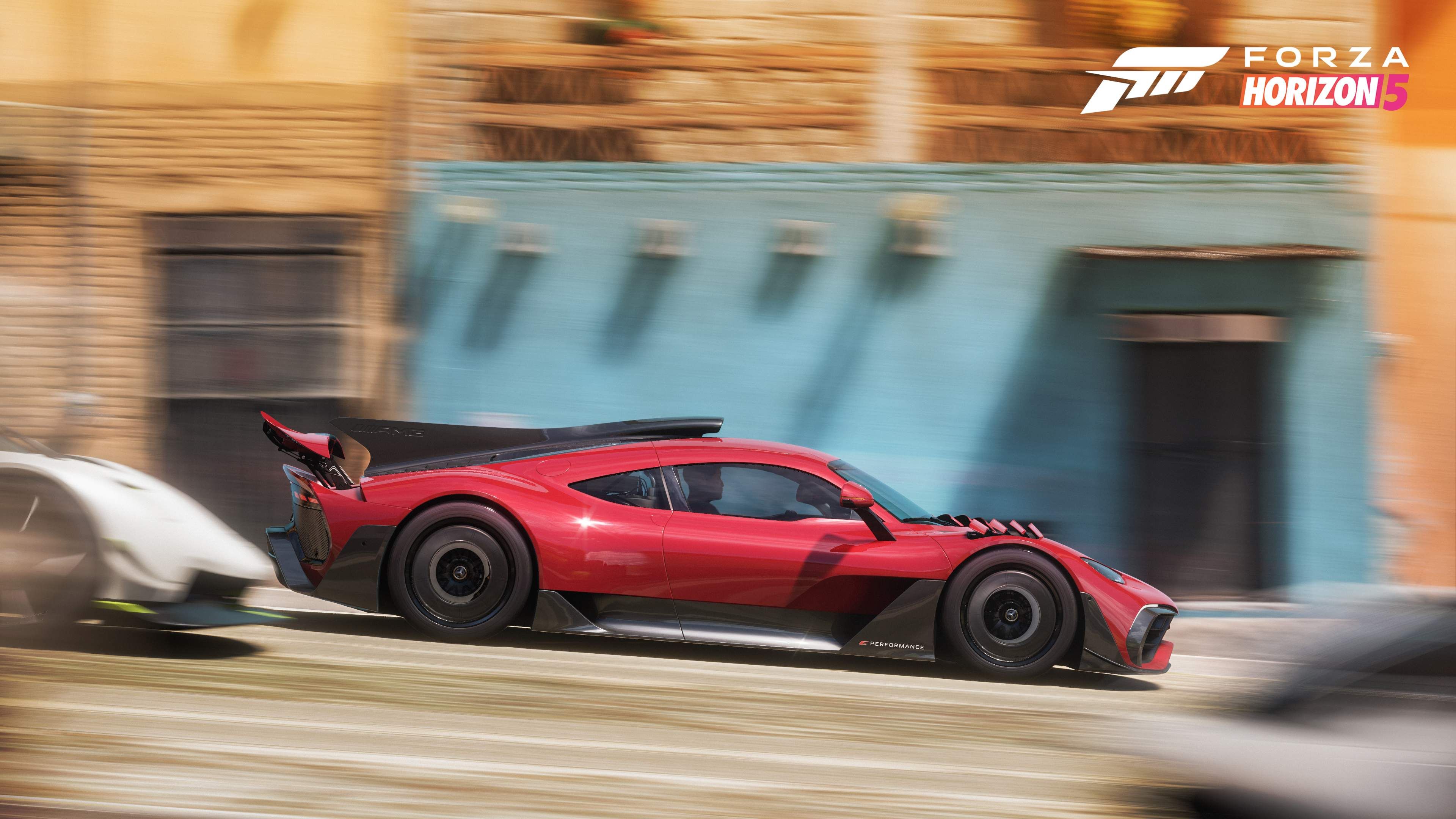 Images of car racing from Forza Horizon 5.