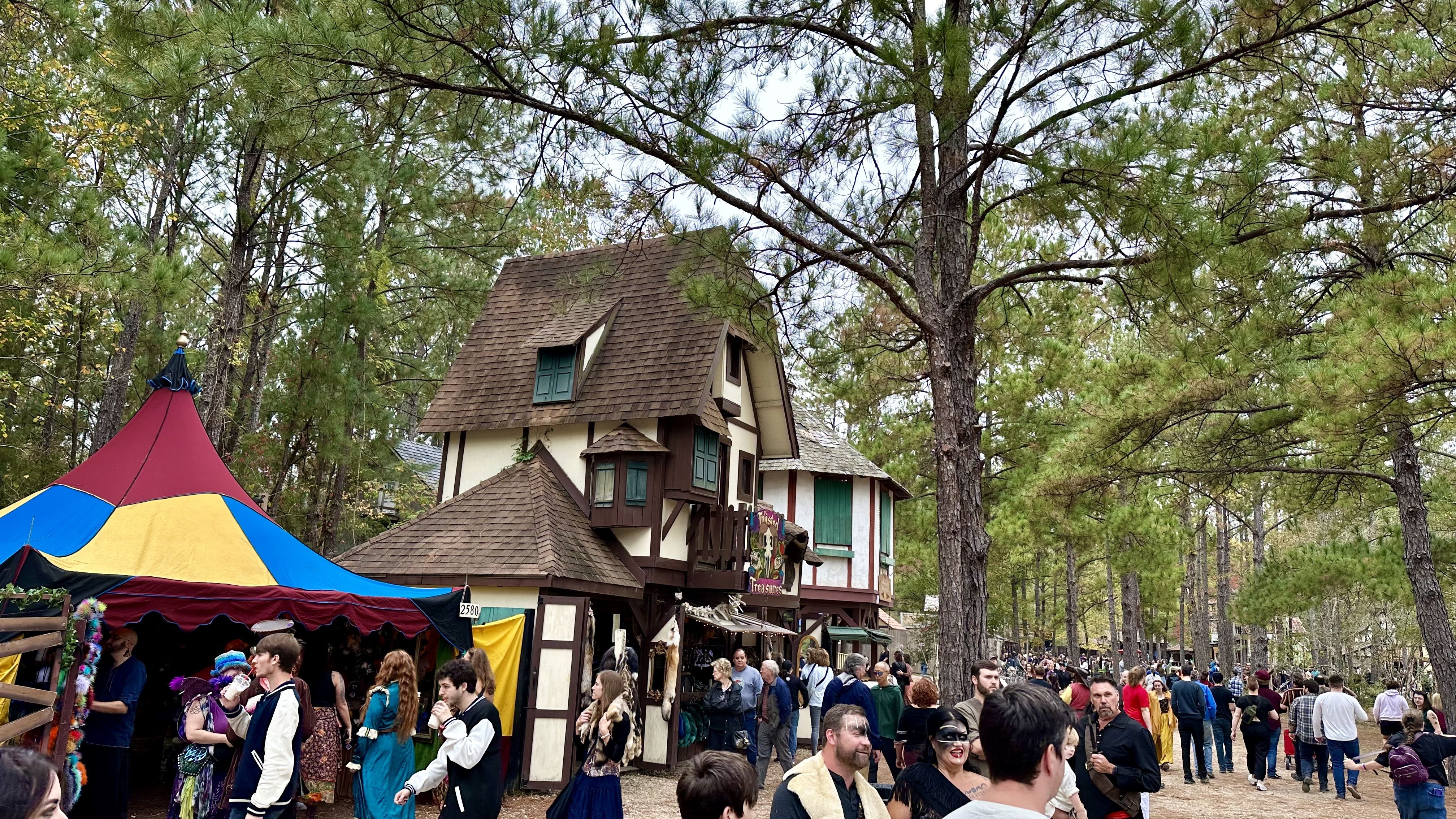 Photo shows old fashioned buildings.