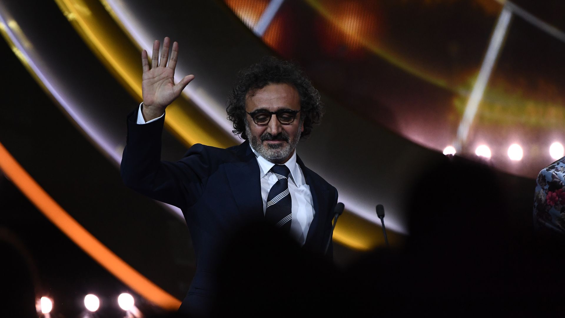 Hamdi Ulukaya is seen on stage at the 2019 Global Citizen Prize at the Royal Albert Hall on December 13, 2019 in London, England.