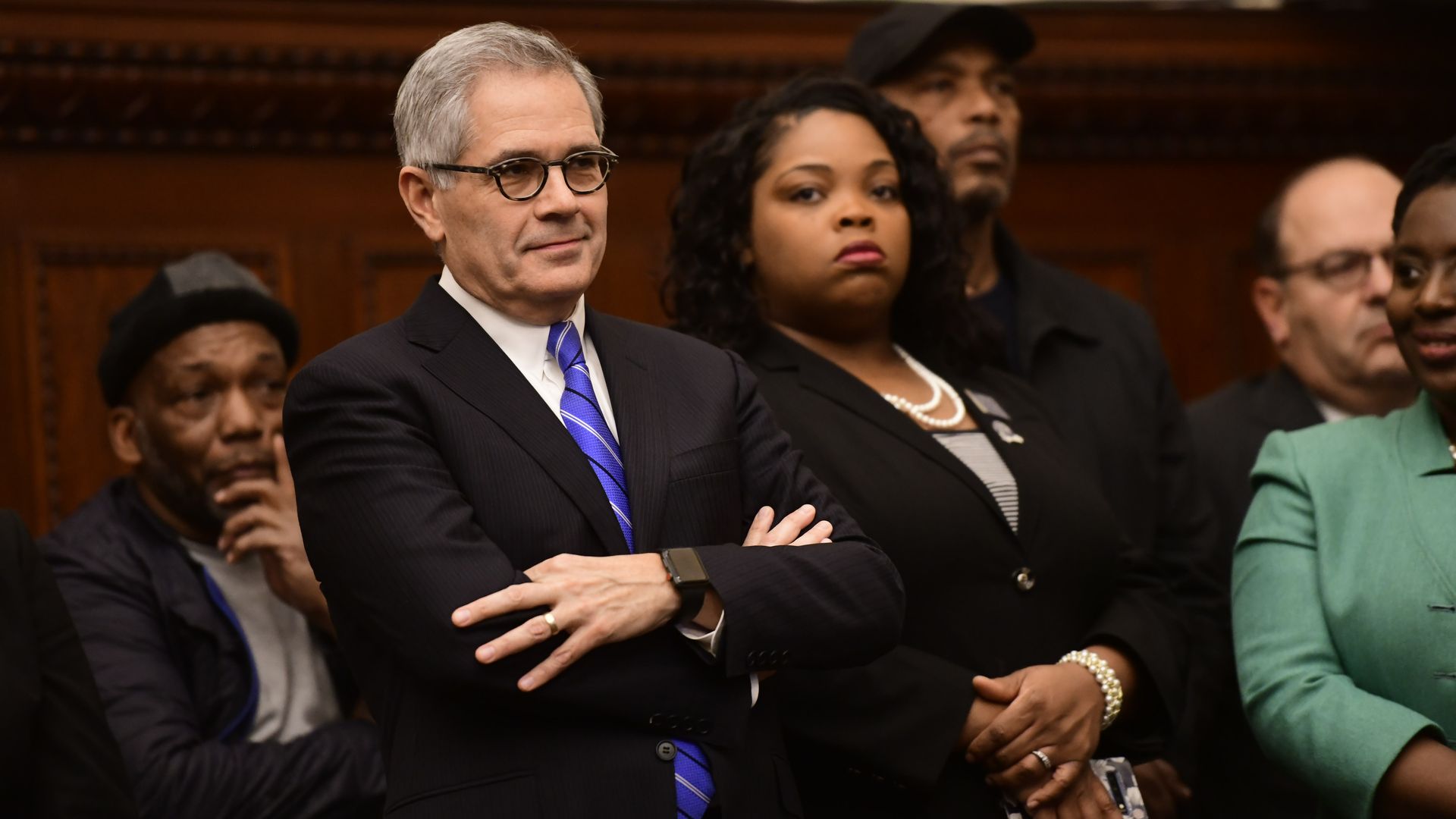 Philadelphia District Attorney Larry Krasner folds his arms.