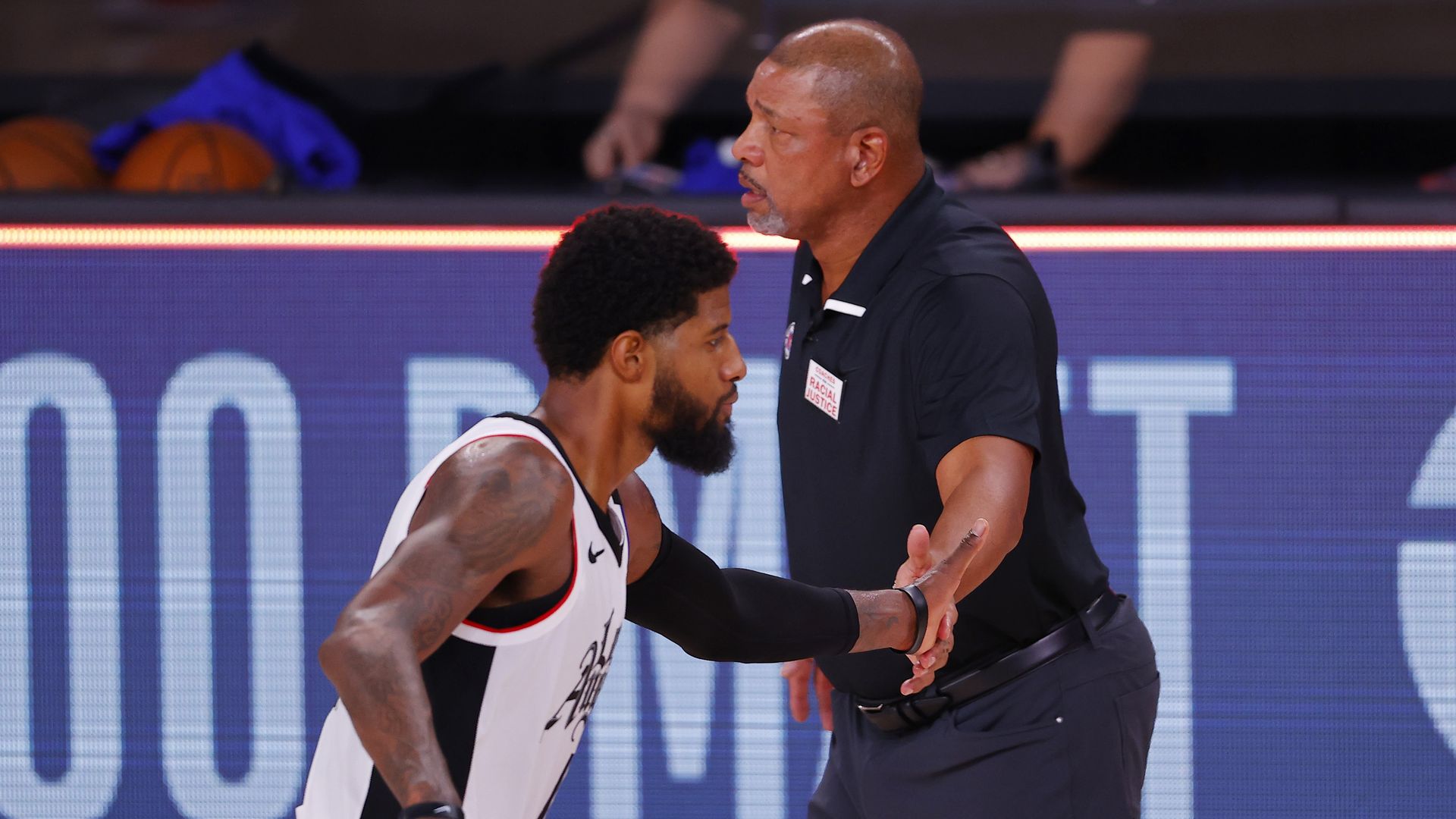 Paul George and Doc Rivers