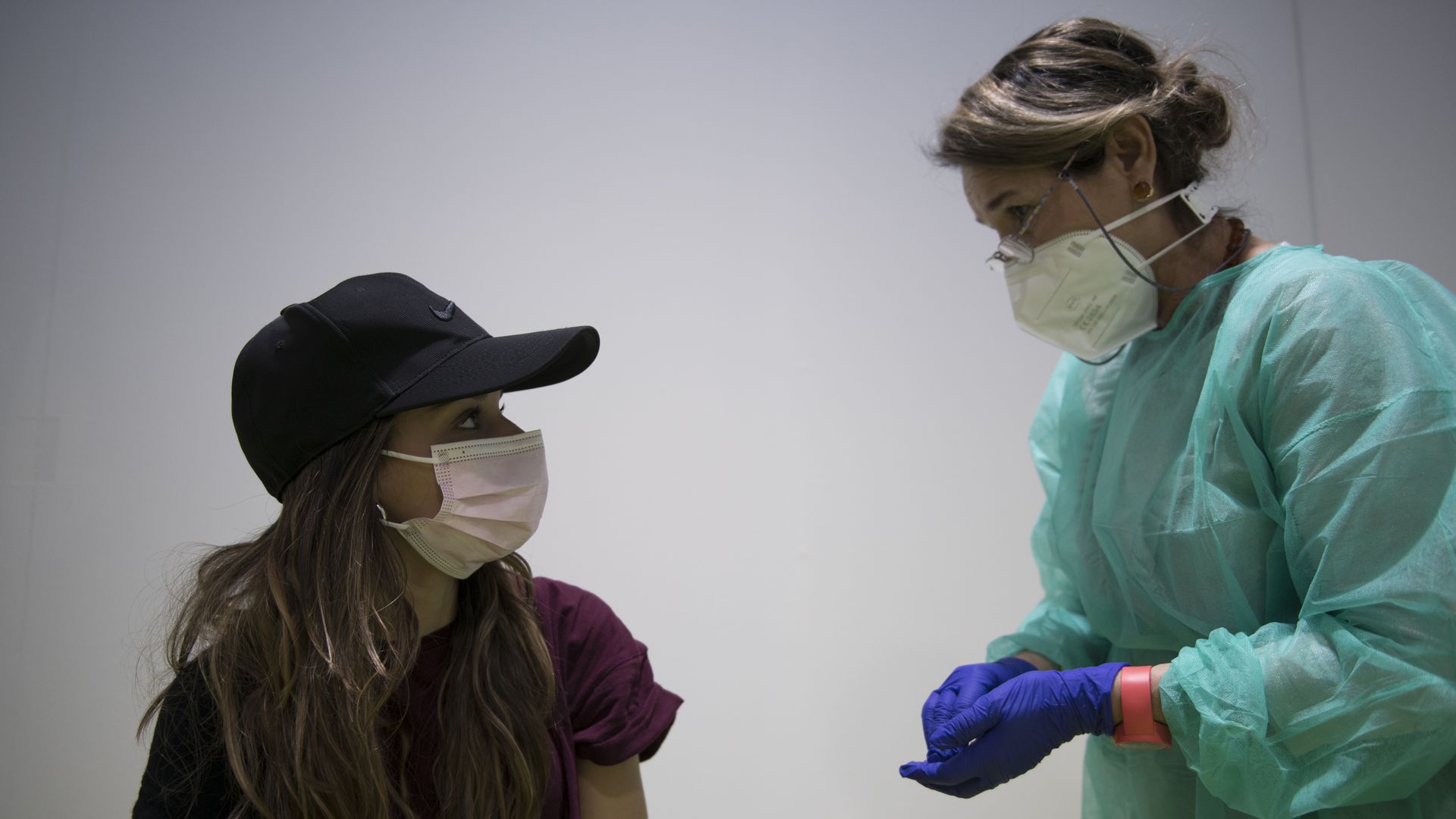 A member of school staff receives the vaccine for COVID 19 by AstraZeneca on CUS Turin University Sports Center on March 14, 2021 in Turin, Italy. 