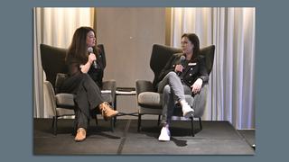 Claire Rychlewski, editor of Health Technology Conventions, and Emily Wilds, MD, Lincoln, each sit in a chair.