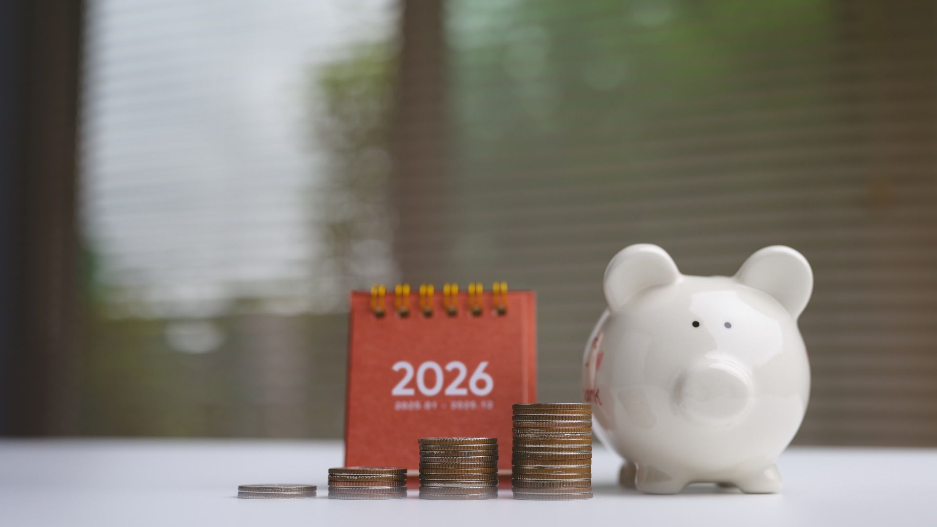 A piggybank and a 2026 calendar.