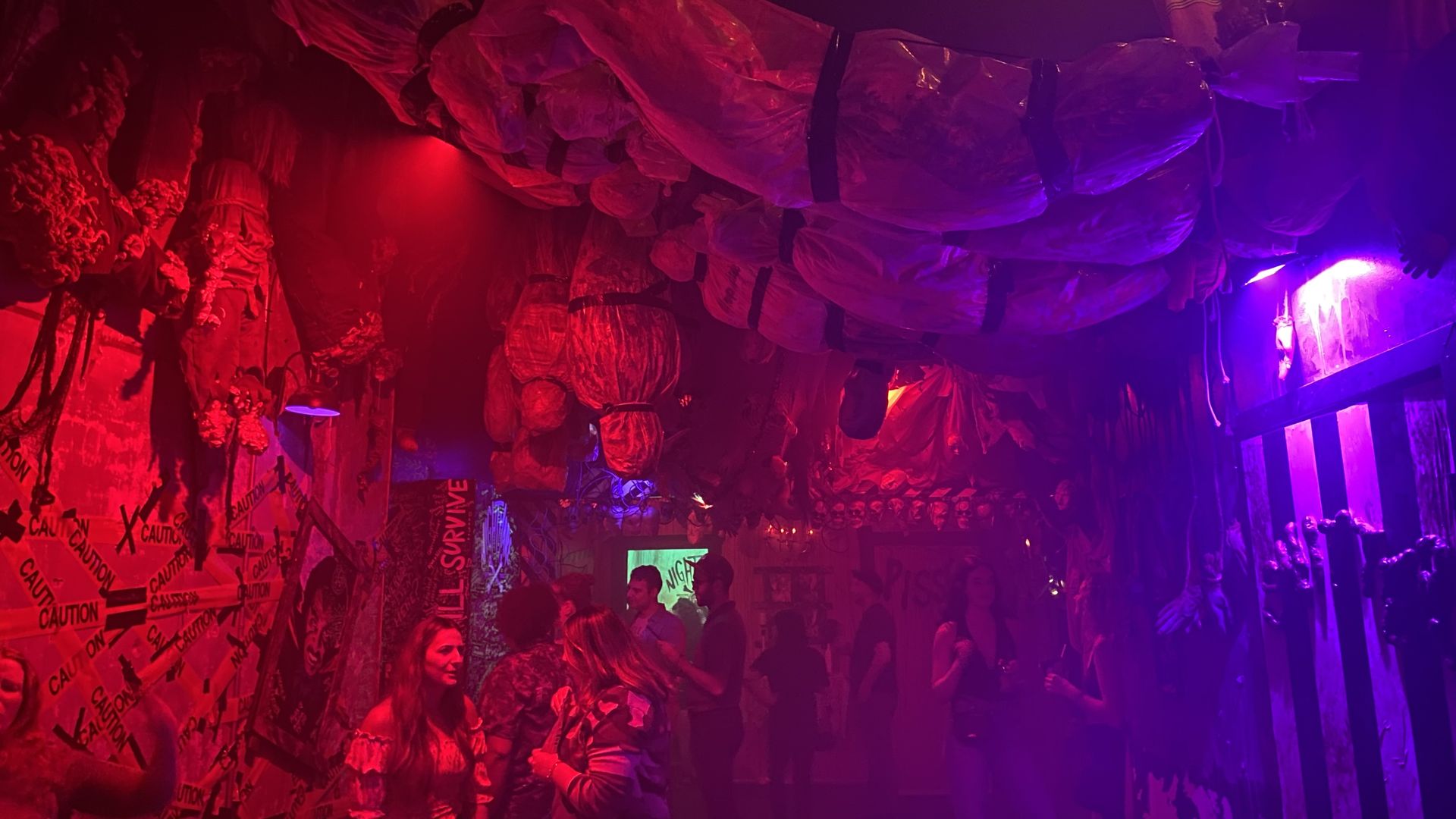 Patrons milling around the inside of the Nightmare Before Tinsel. Photo: Taylor Allen/Axios