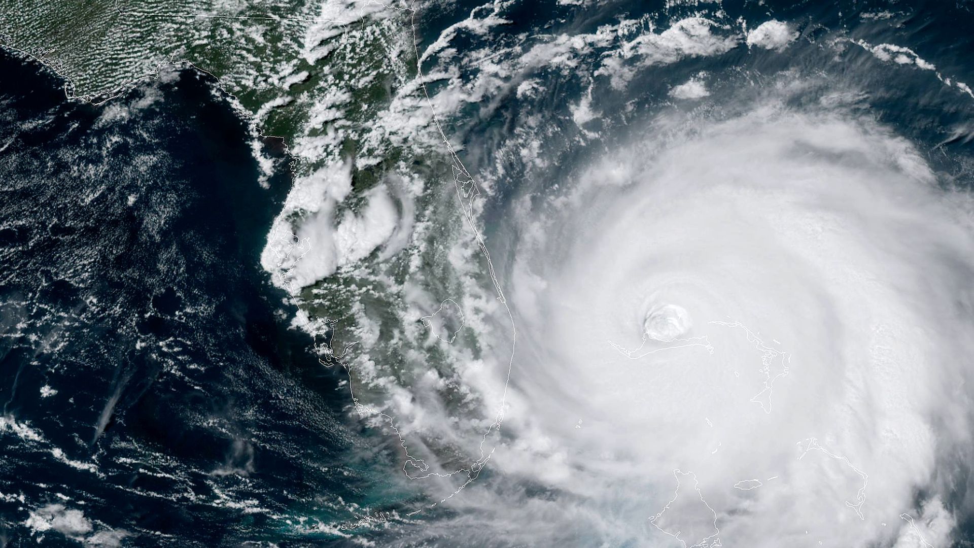 Satellite image showing a hurricane lurking off the coast of Florida.
