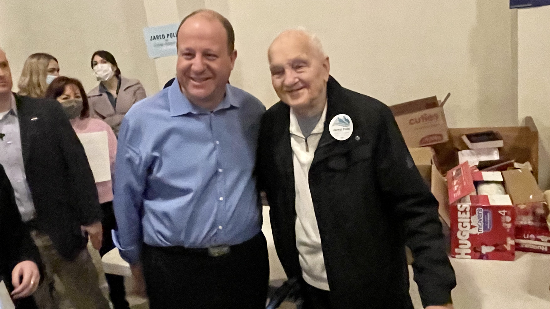 Gov. Jared Polis poses for a photo at a campaign event in Aurora. Photo: John Frank/Axios