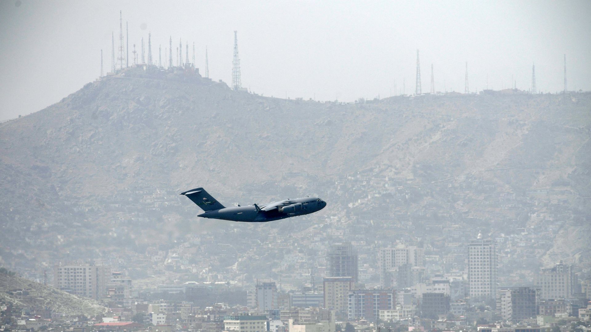 An US Air Force aircraft takes off from the airport in Kabul on August 30, 2021