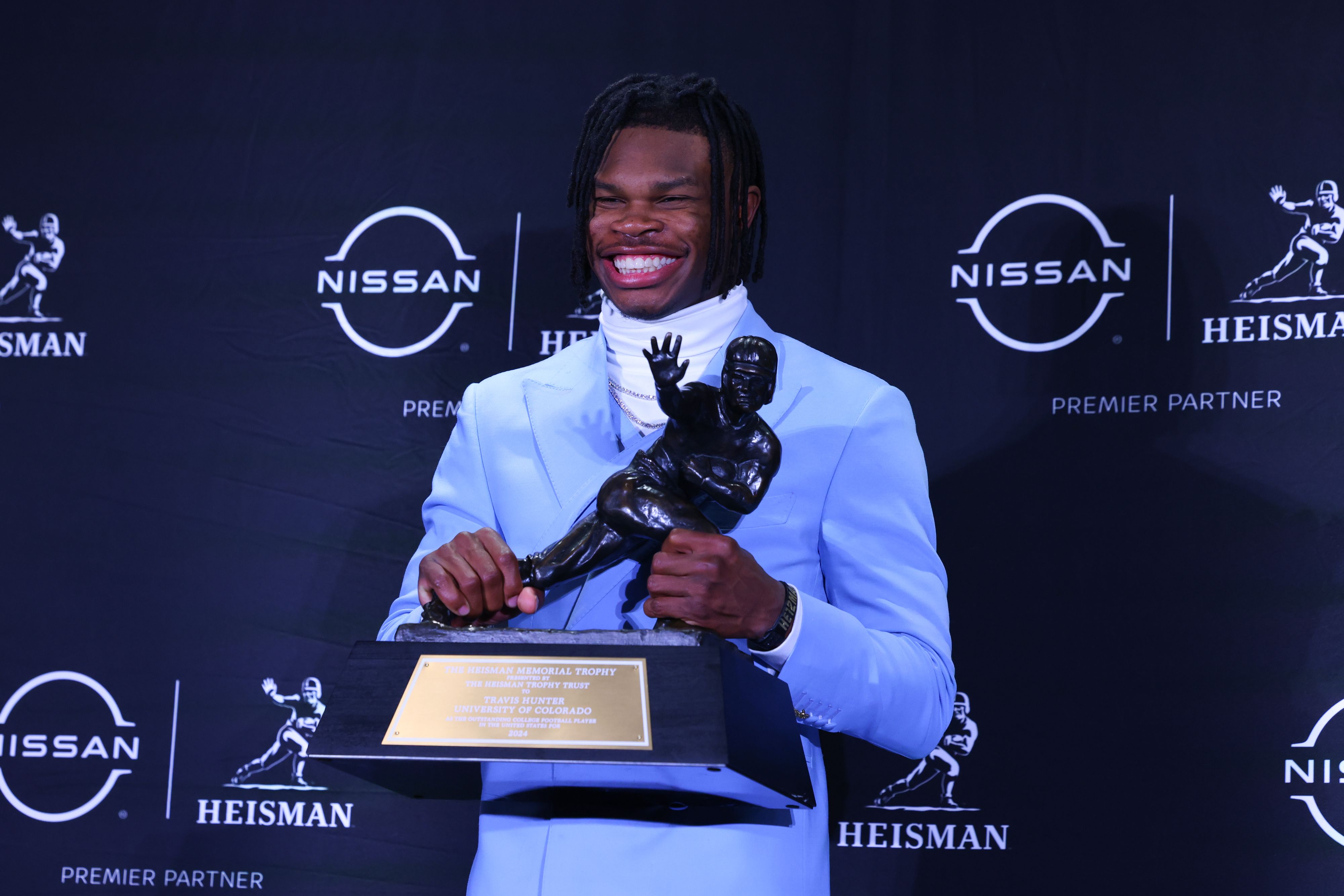 Hunter poses with the trophy