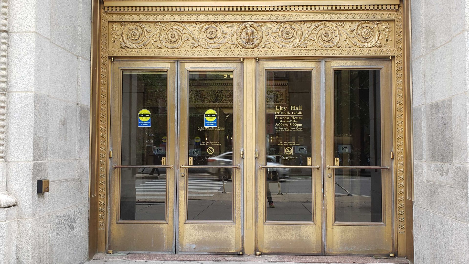 A photo of the doors at City Hall. 