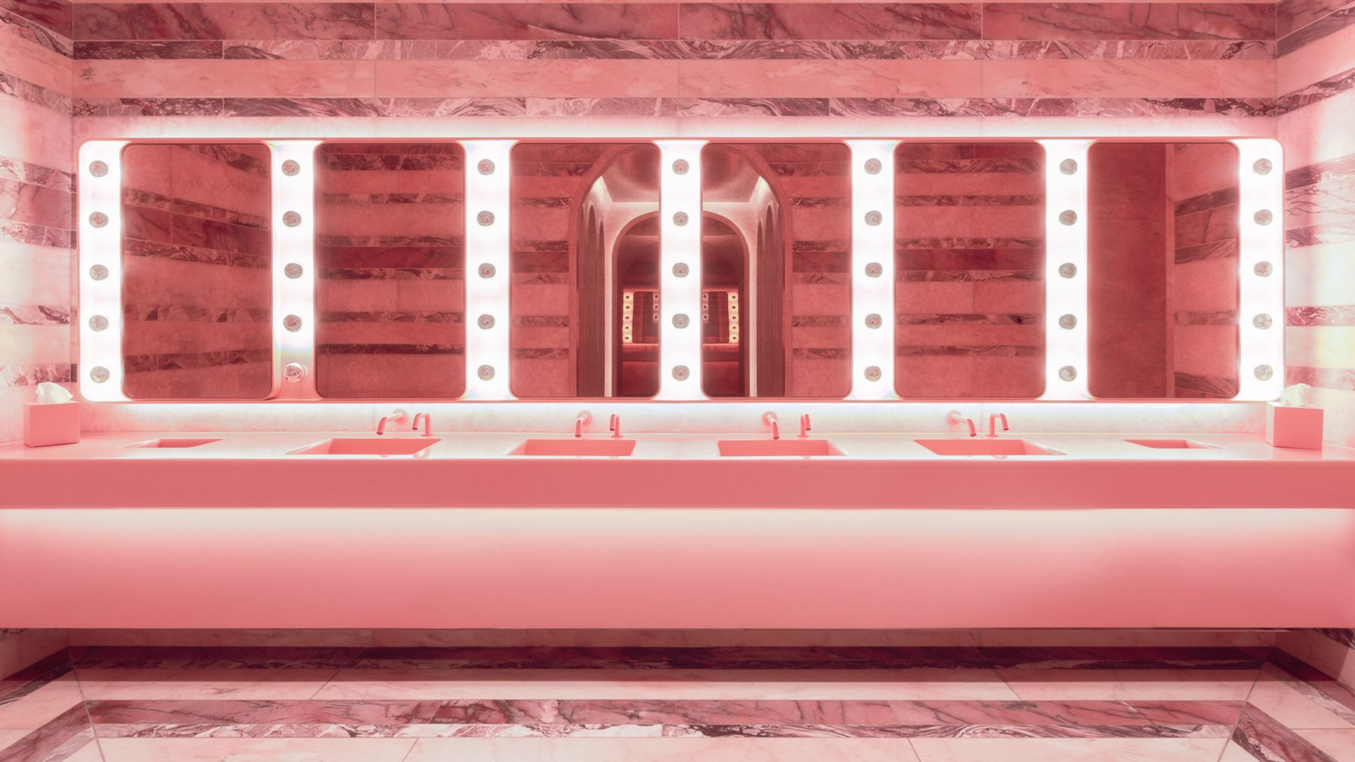 A bright pink bathroom.