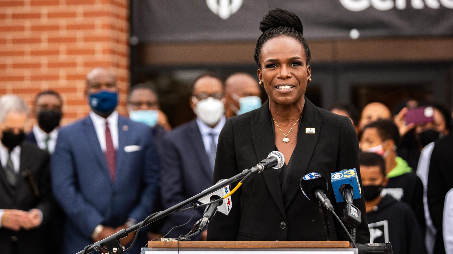 Ala Stanford stands in front of the new health clinic that bears her name. 