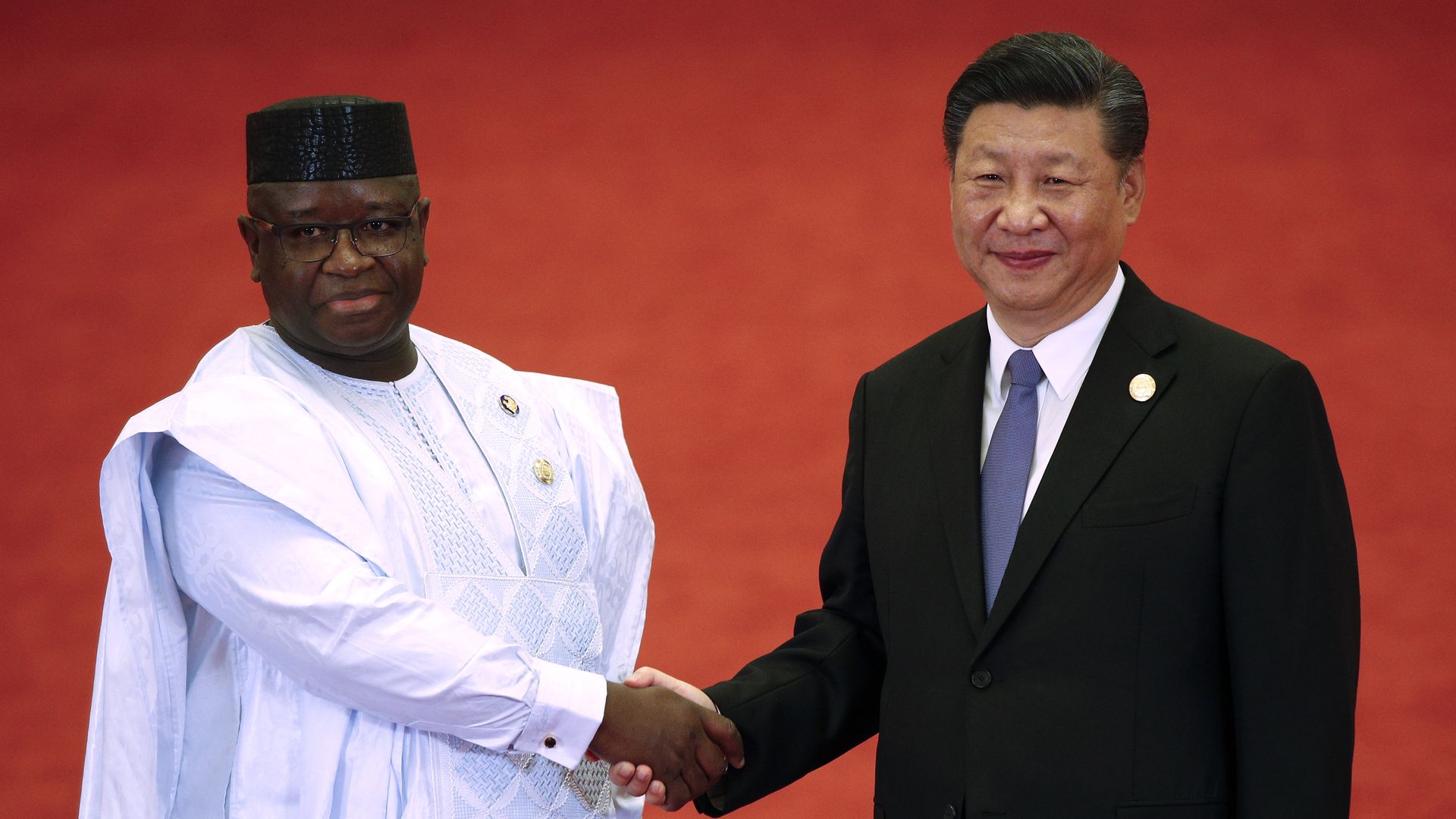 Sierra Leone President Julius Maada Bio shakes hands with Chinese President Xi Jinping during the Forum on China-Africa Cooperation on September 3, 2018 in Beijing, China.