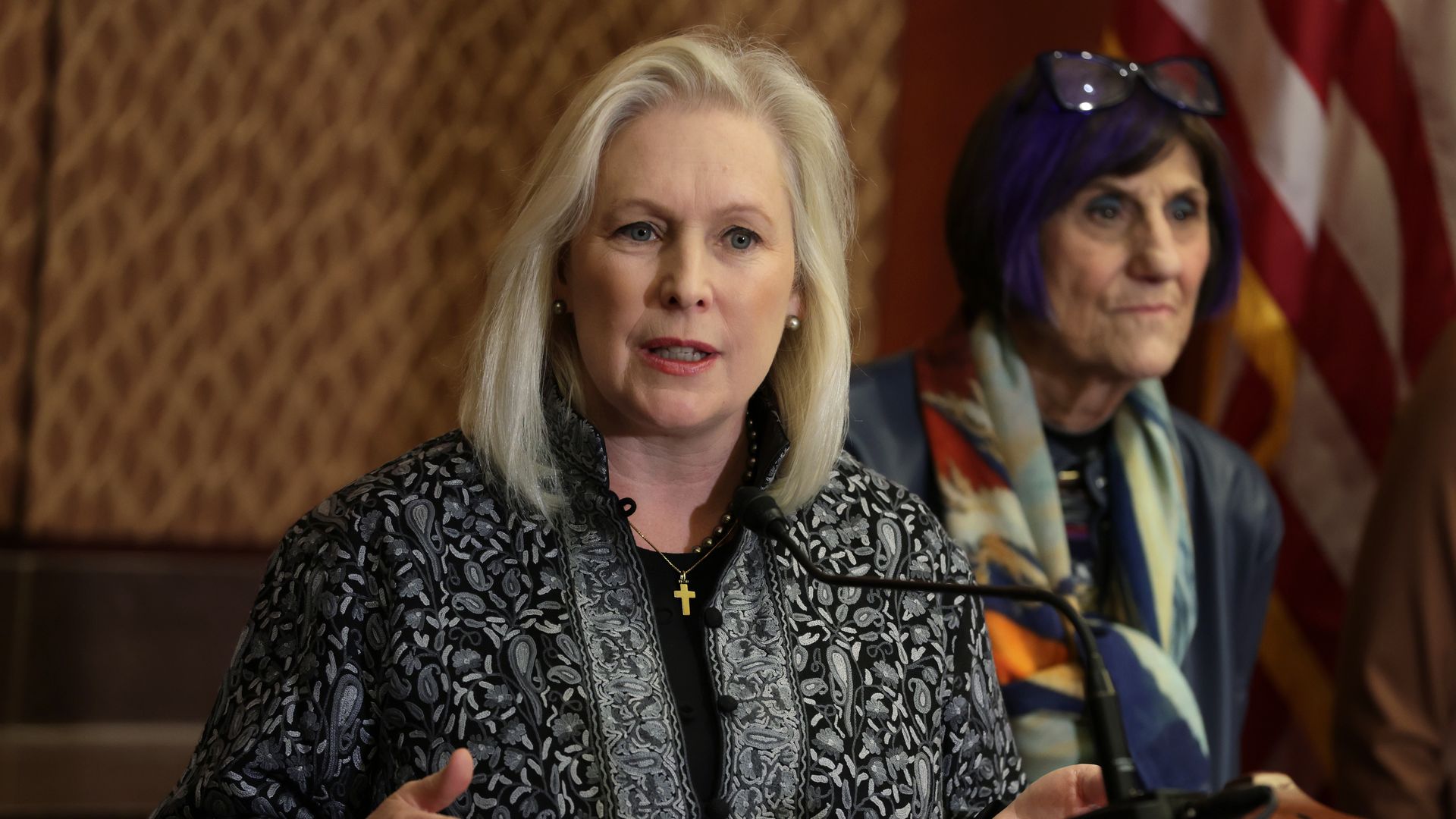 U.S. Sen. Kirsten Gillibrand (D-NY) speaks as Rep. Rosa DeLauro (D-CT) listens during a news conference on the Family and Medical Leave Act at the U.S. Capitol on February 1, 2023