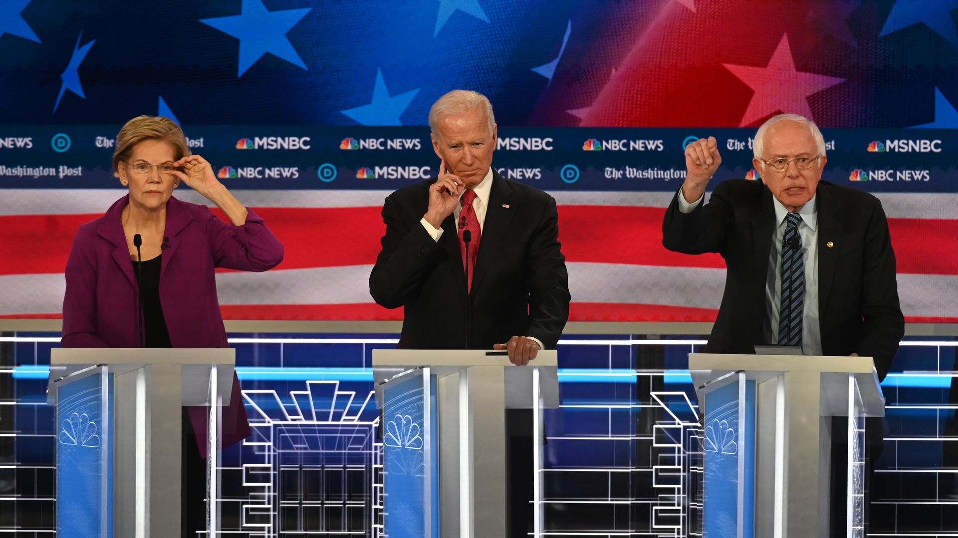 Elizabeth Warren, Joe Biden and Bernie Sanders at a debate