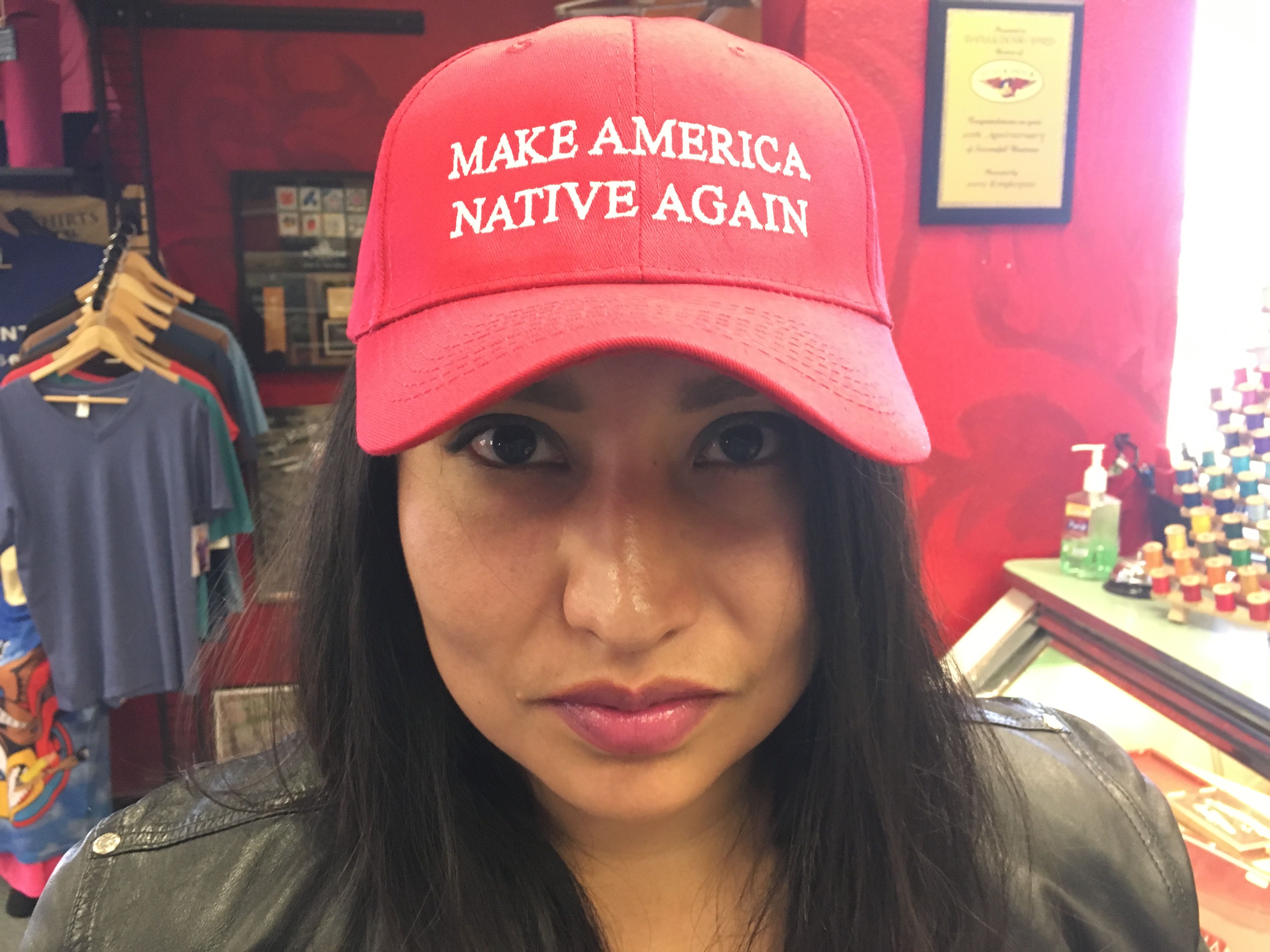 Navajo artist Vanessa Bowen wears her "Make American Native Again" hat.