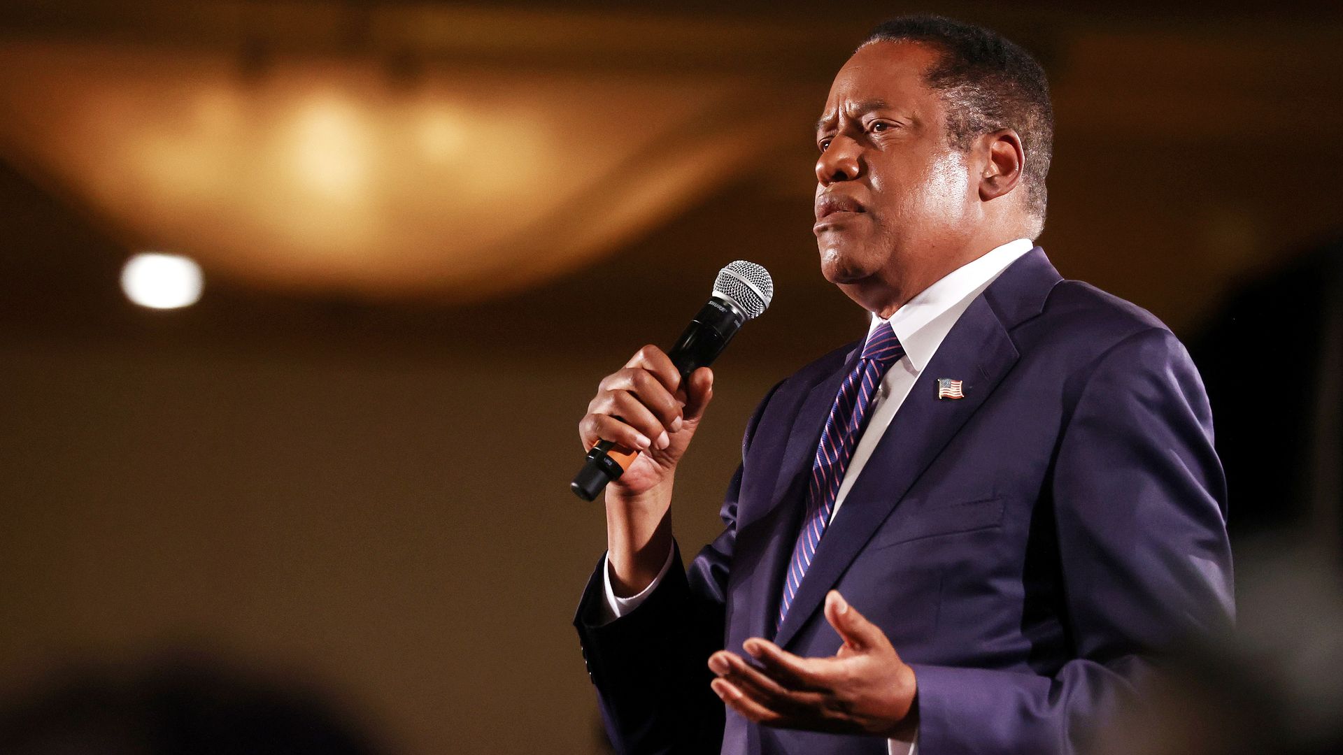 Larry Elder speaking in Costa Mesa, California, on Sept. 14.