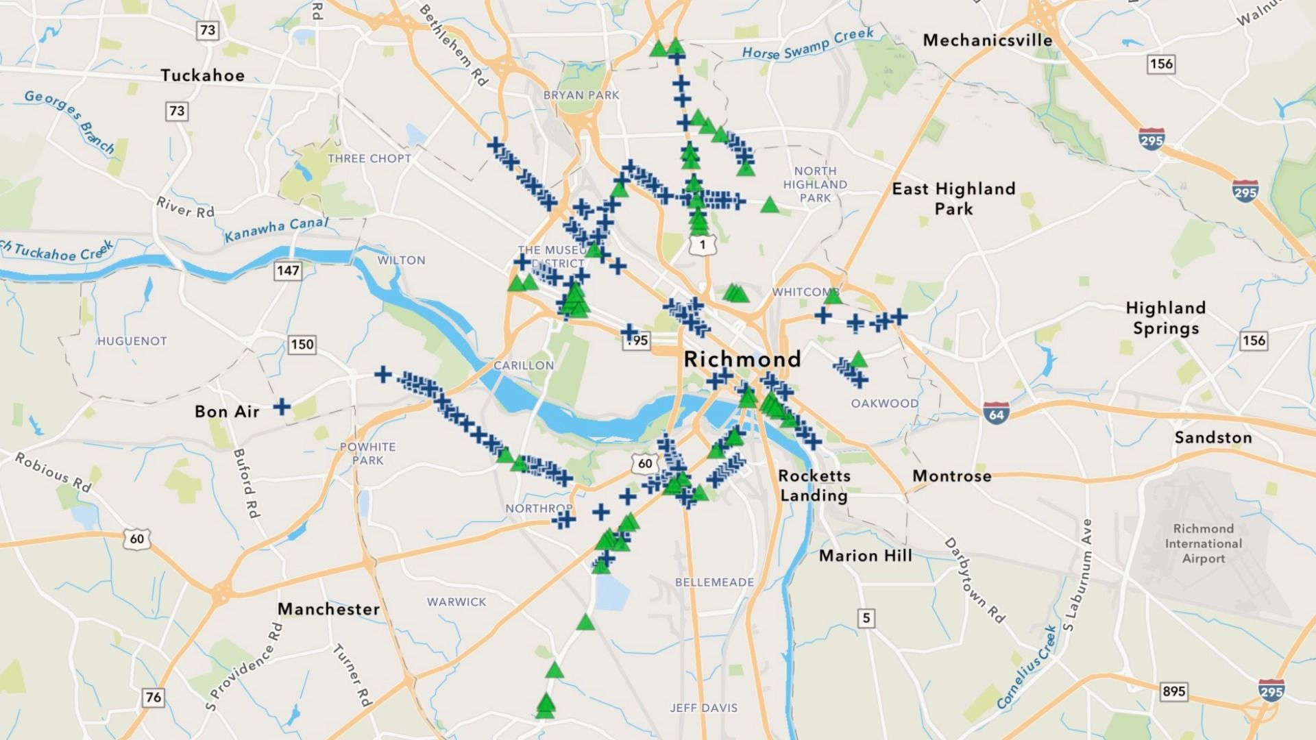 Map of the Richmond, Virginia area showing numerous blue hospital crosses and green tree icons clustered around the city center along major roads near the James River and Kanawha Canal.