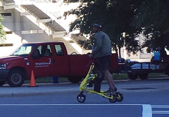 cam-newton-on-scooter-charlotte