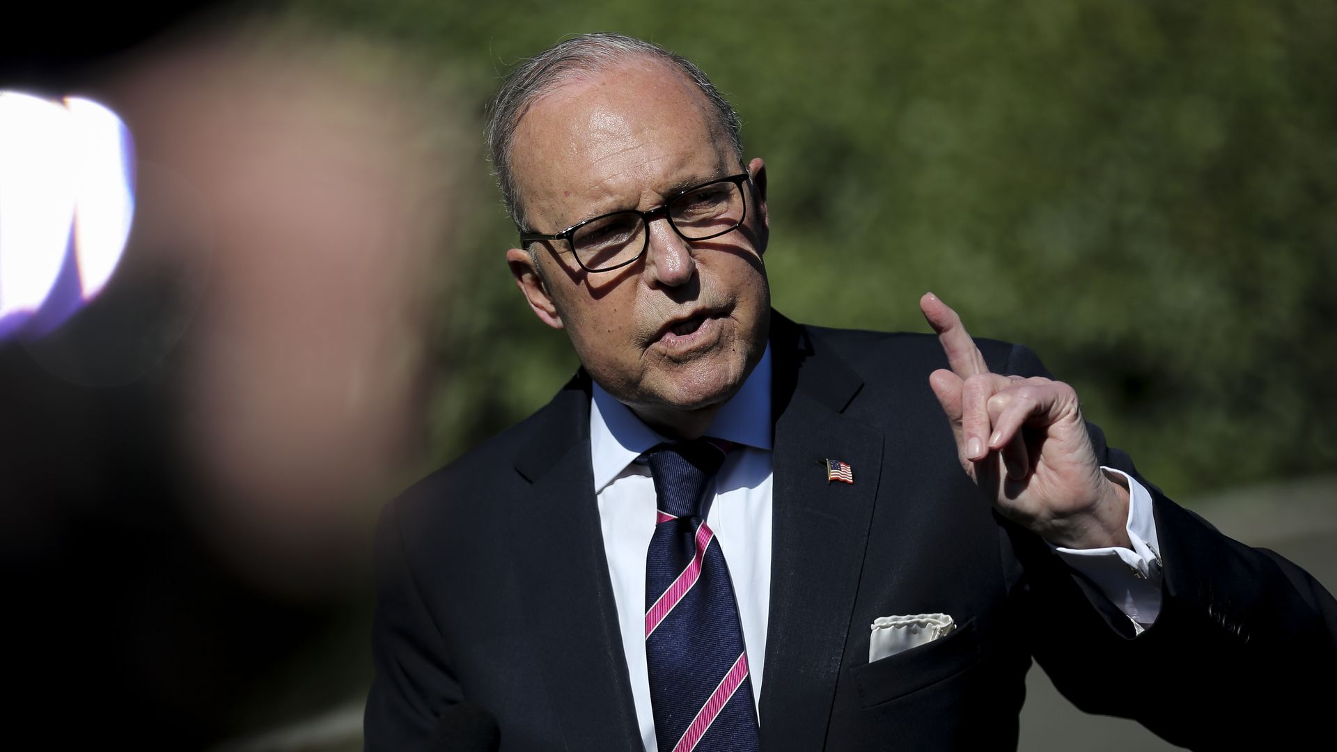 Larry Kudlow speaking to reporters.