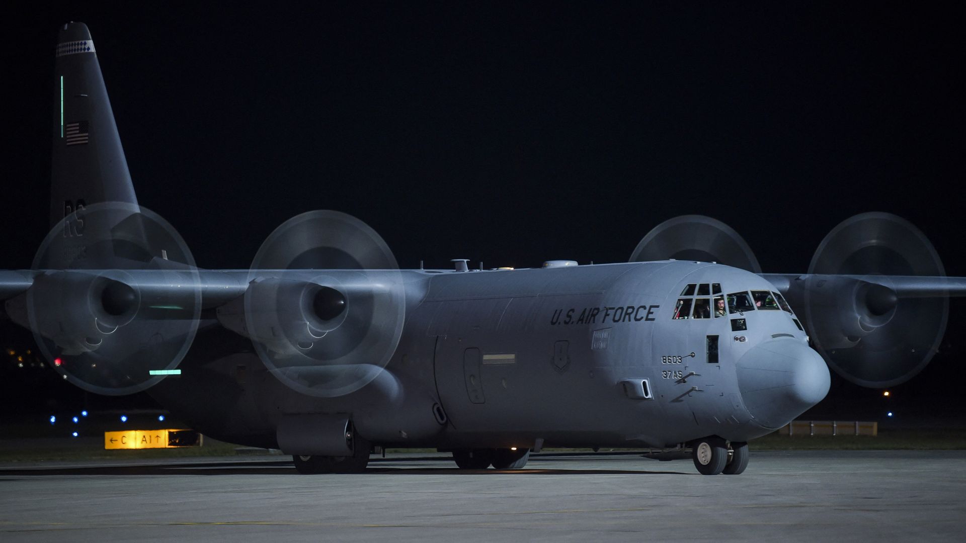 A U.S Air Force carrying Afghan refugees at Pristina International Airport last August.