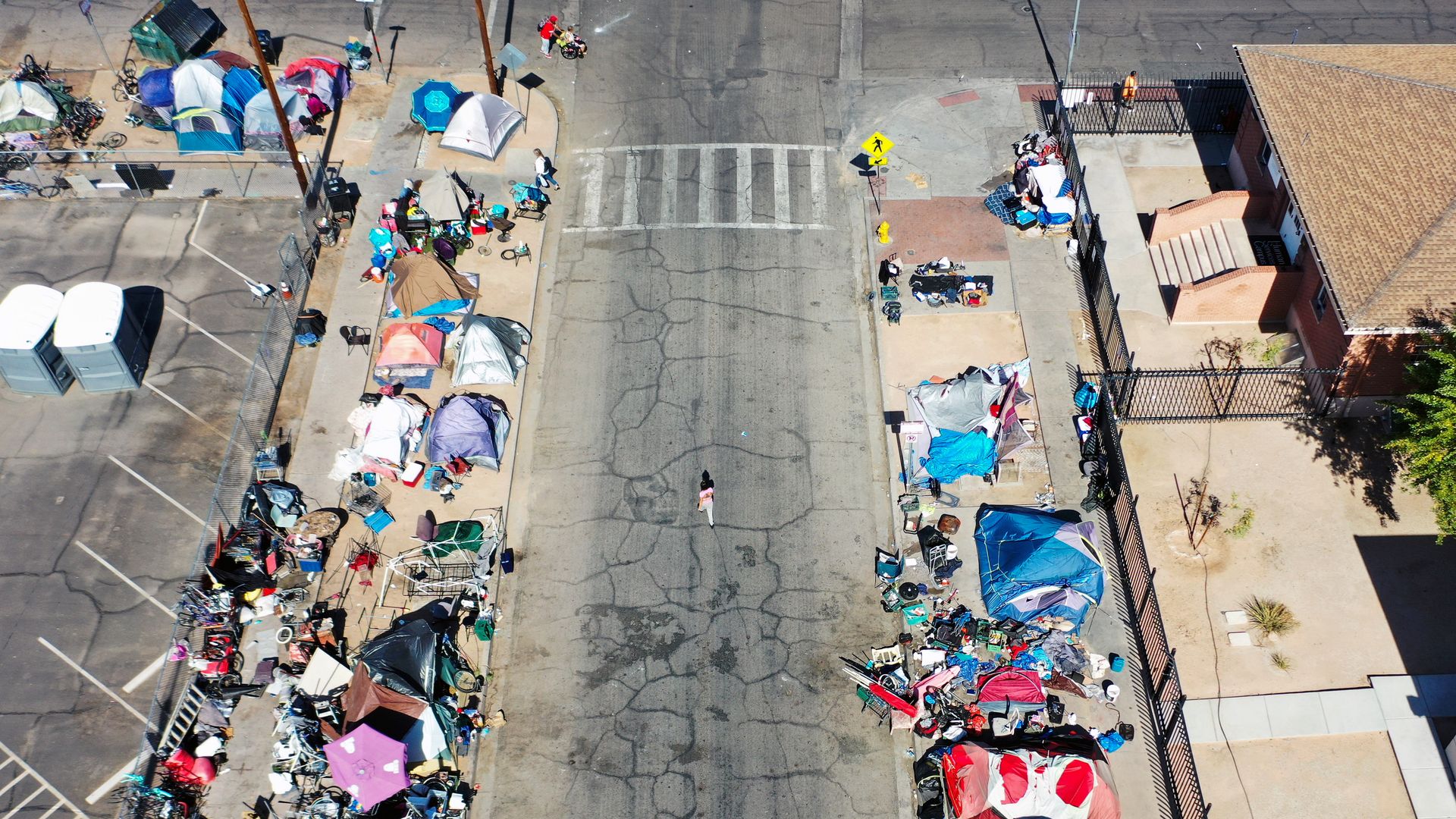 Tents on the side of a road.