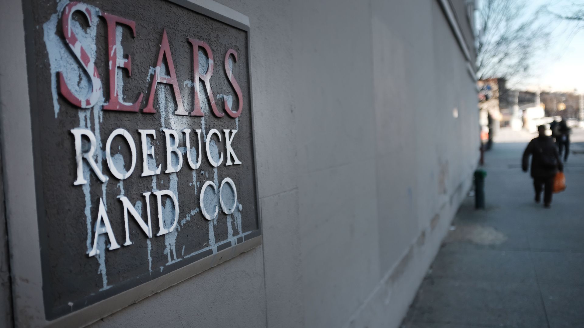 Fainted sign that says Sears