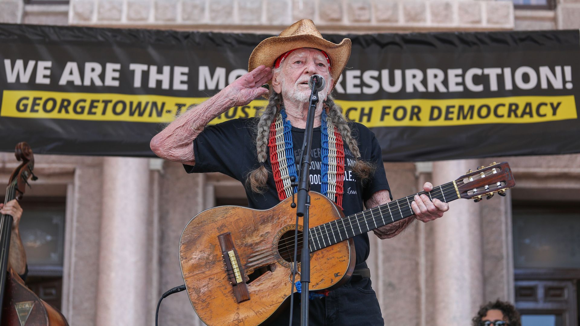 Willie Nelson performs at a protest at the Texas state capitol
