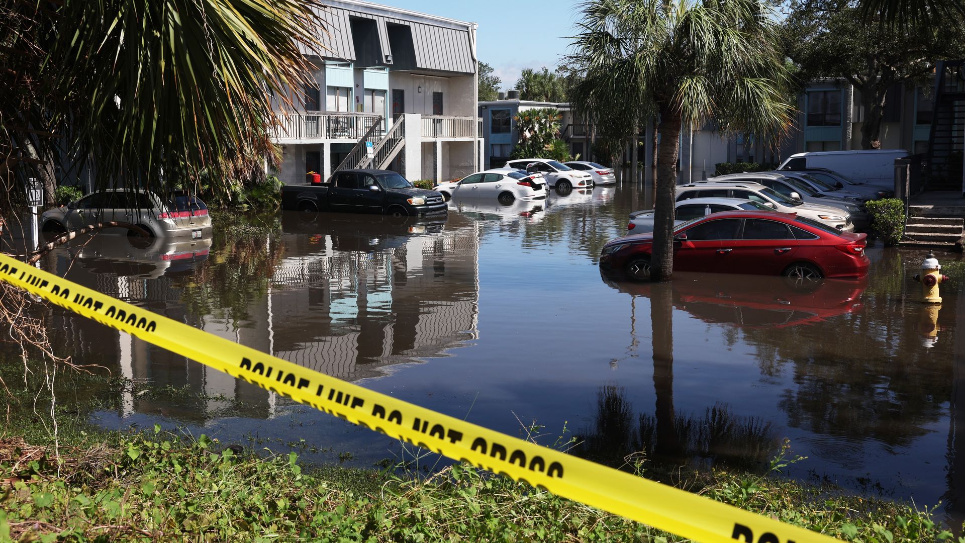Cars are flooded in an apartment complex after the arrival of Hurricane Milton on October 10, 2024 in Clearwater, Florida. Milton, which comes just after the recent catastrophic Hurricane Helene, landed into Florida's Gulf Coast late Wednesday evening as a Category 3 storm causing extensive flooding